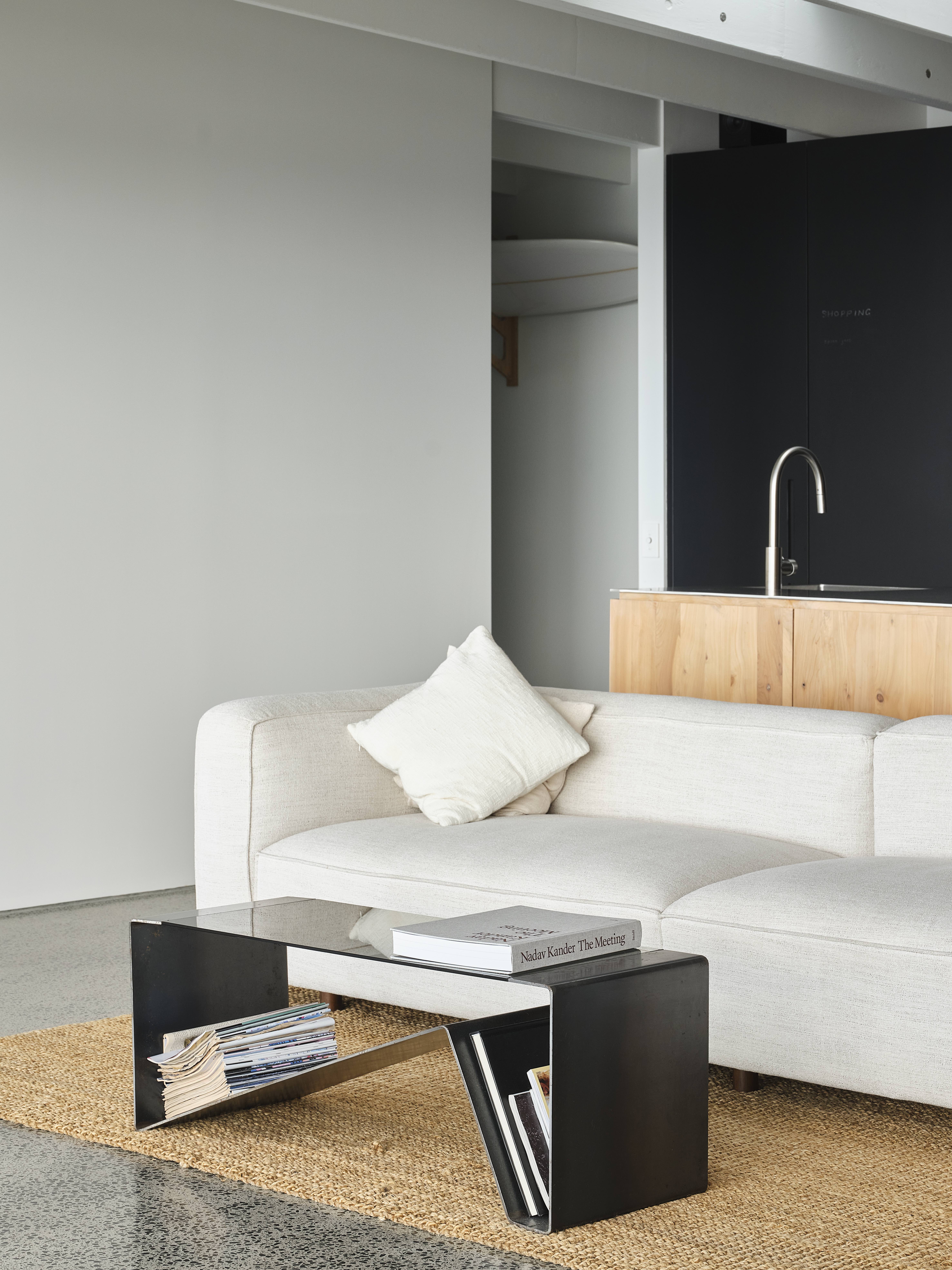 MDA House by Matt Deeb Architecture: Living room and kitchen