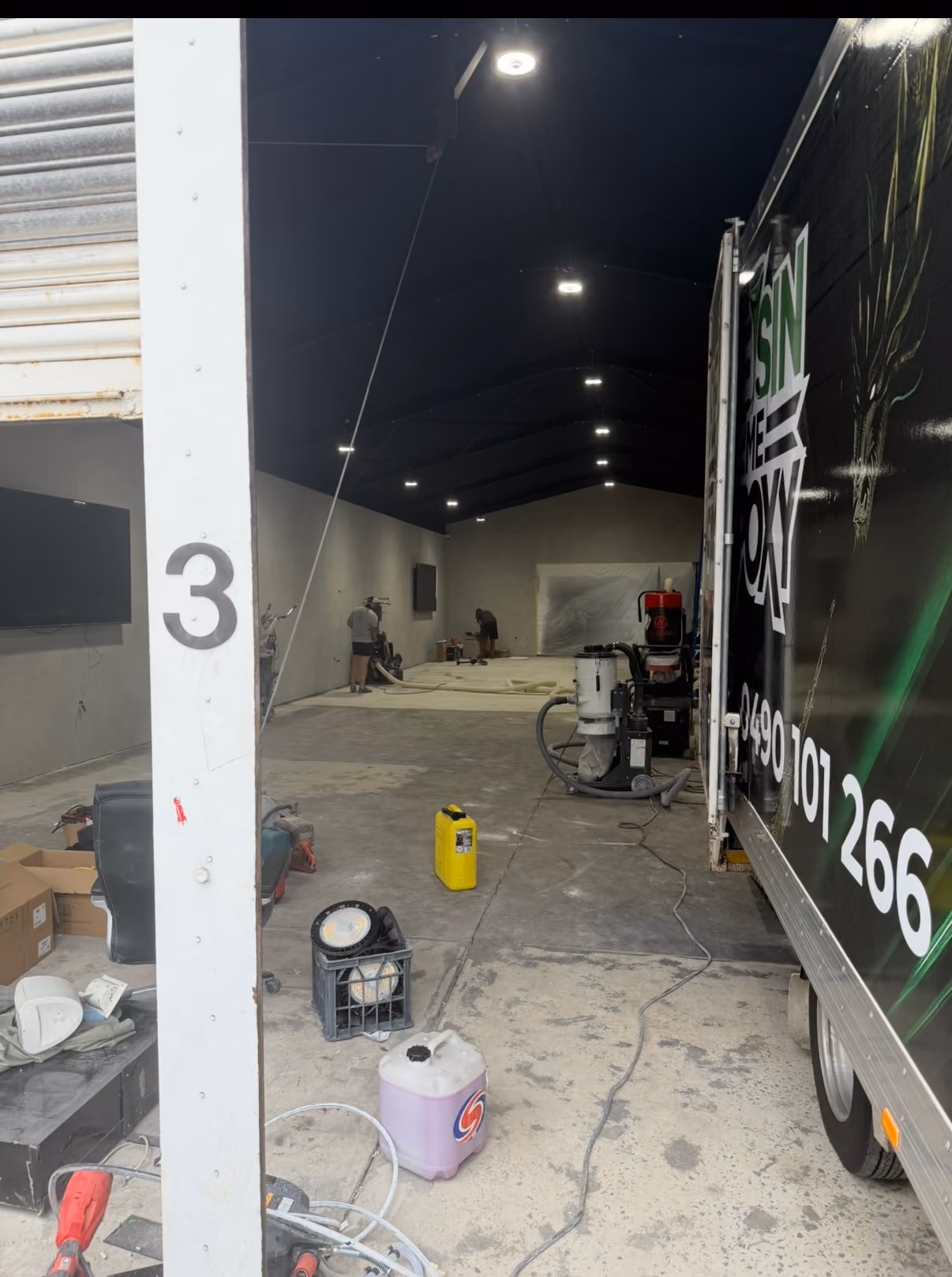 Floor preparation for a luxury car-rental showroom