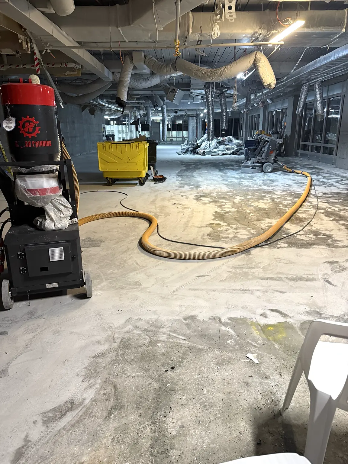 H-Class dust extraction supporting concrete grinding on a Sydney commercial site