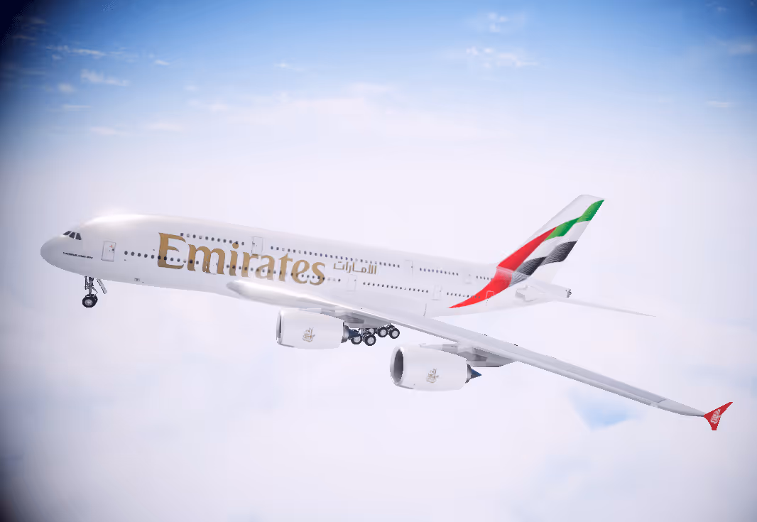 Emirates Airlines commercial aircraft in flight against cloudy sky