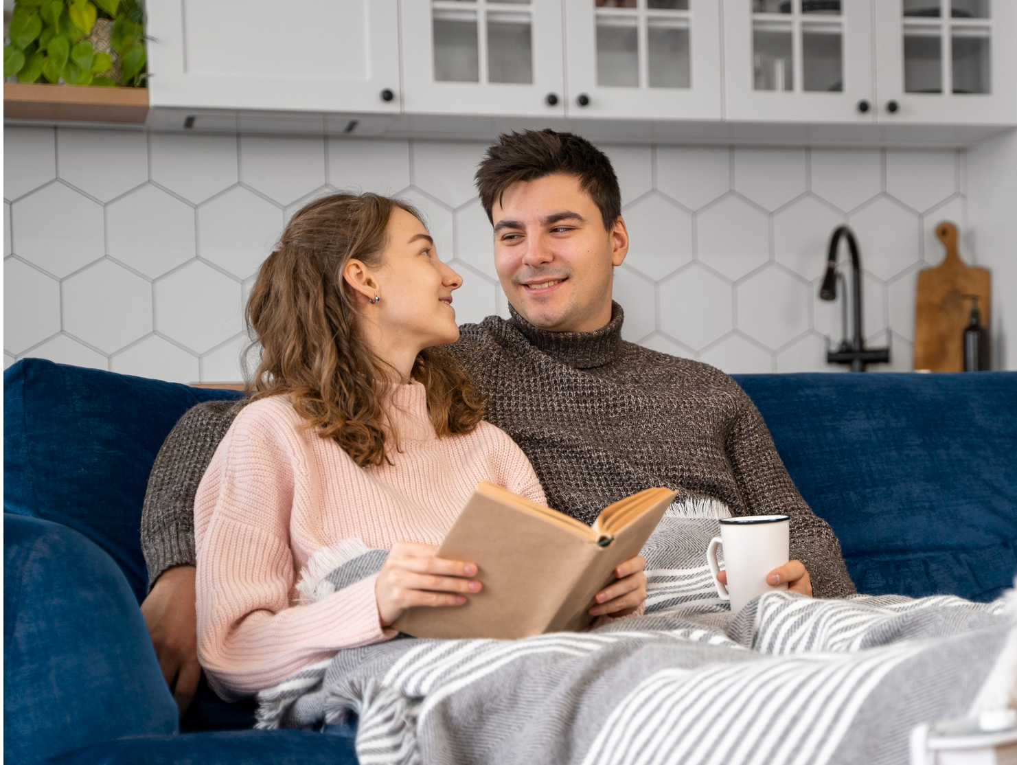 Couple relaxing comfortably at home