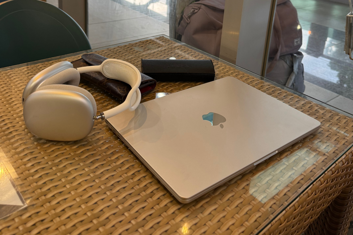At Puerto Princesa Airport, Jen works on her laptop, sending quick emails and scheduling travel content before checking in for her flight.
