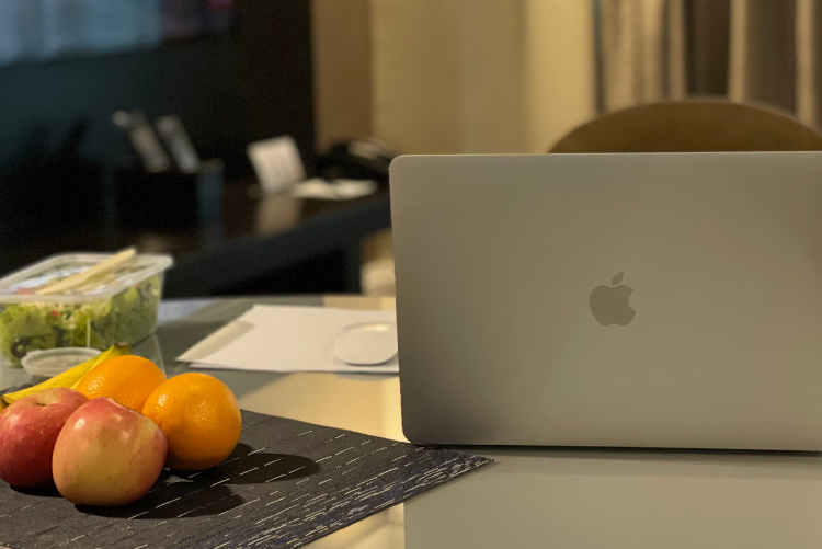 Remote work setup at Somerset Millennium Makati, showing the balance of freelancing and travel life in Manila.