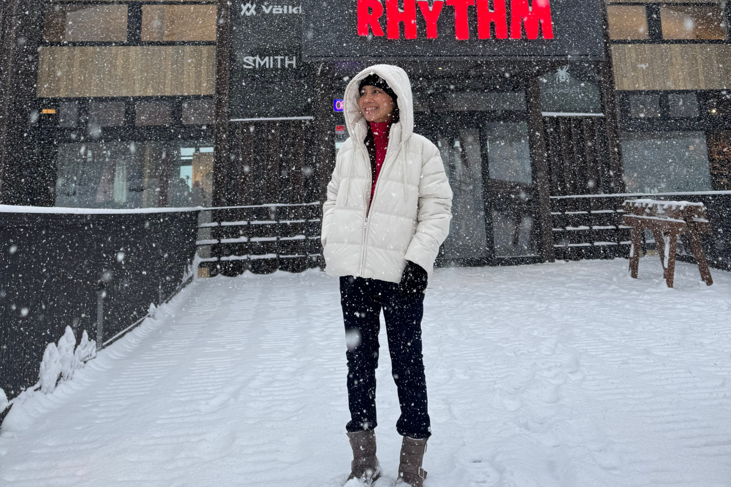Standing outside Rhythm Niseko in -2°C weather, surrounded by thick snow before picking up ski and snowboard gear.