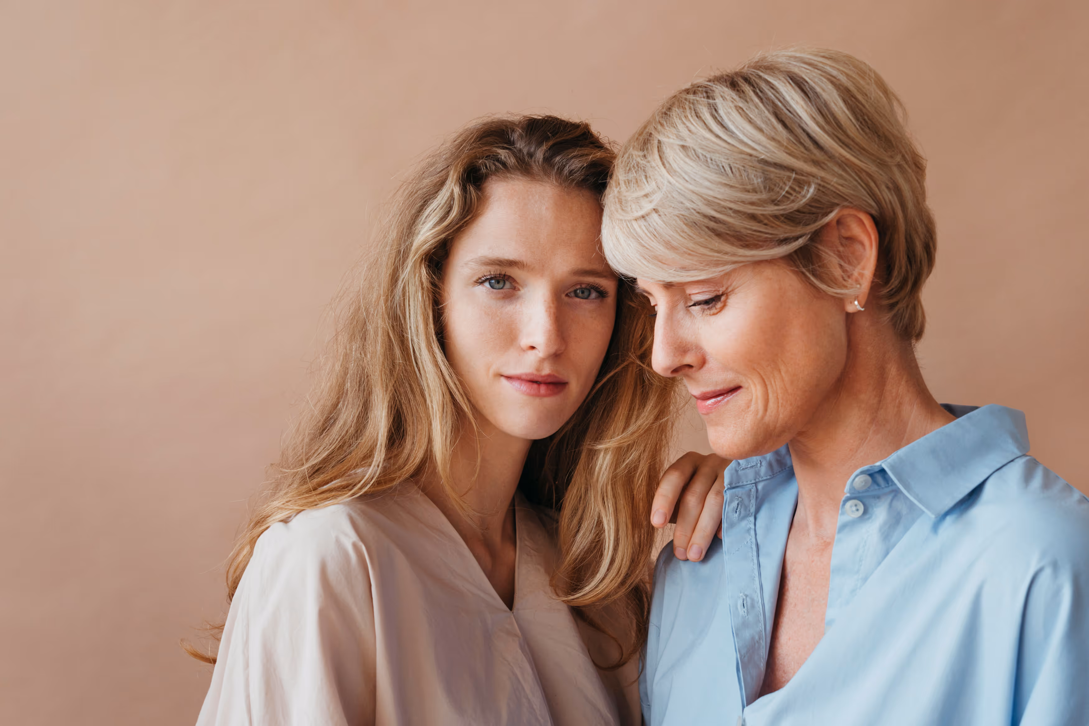 Mother and daughter embracing
