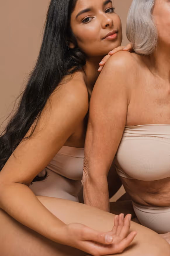 Young woman embracing older woman