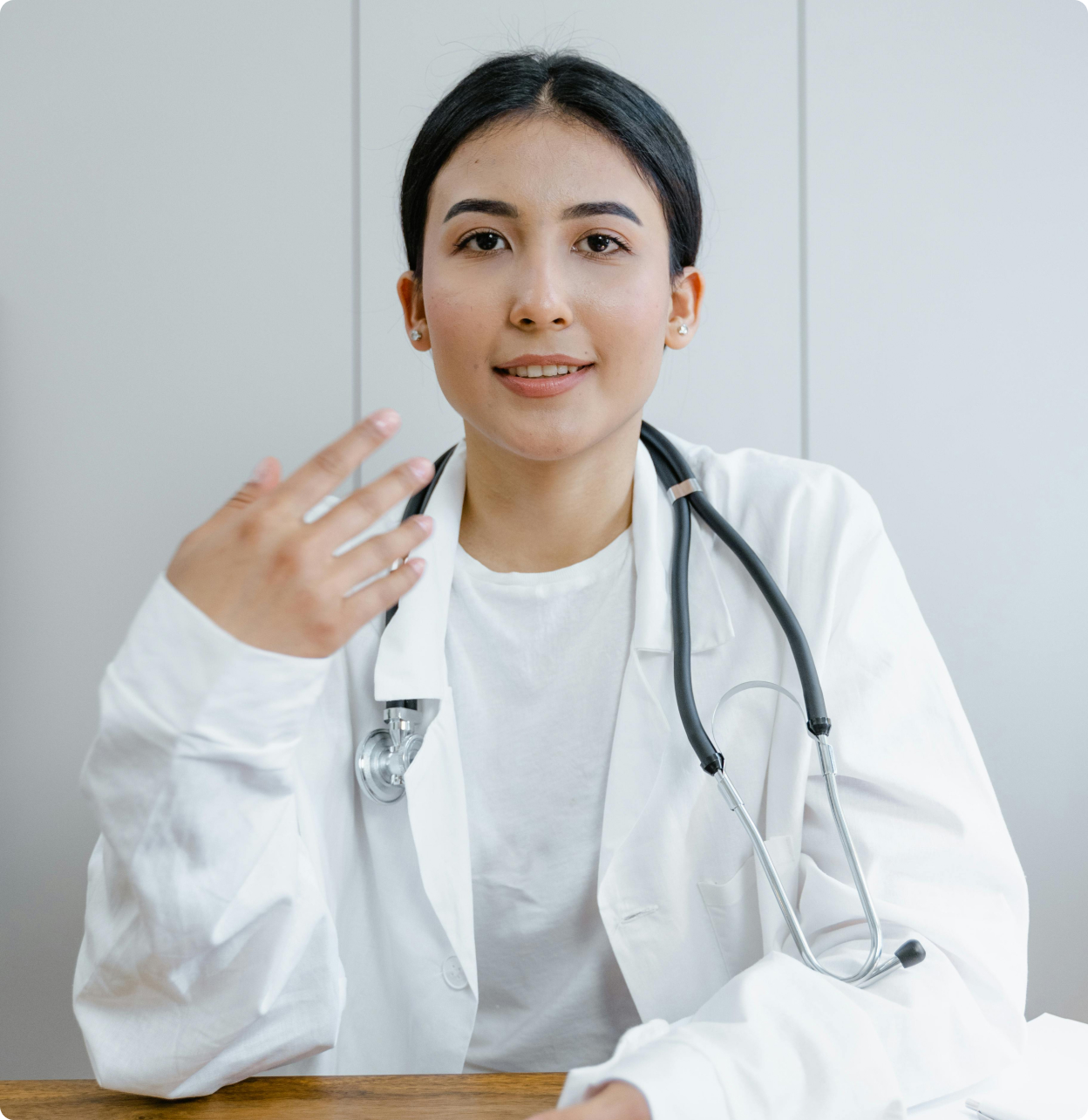 Nurse providing telehealth care during virtual video appointment.