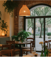 Interior of Maison Verde restaurant with warm Mediterranean design, wooden tables, and soft daylight atmosphere