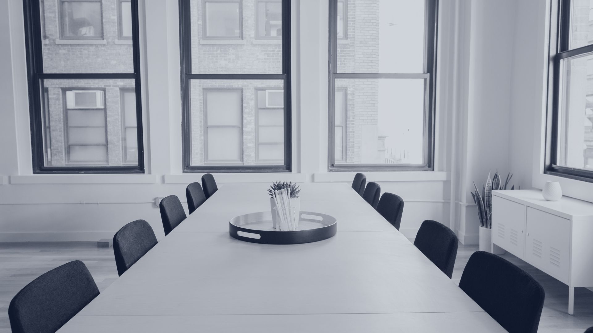 Empty conference table in a meeting room for a founder guide to working with lawyers
