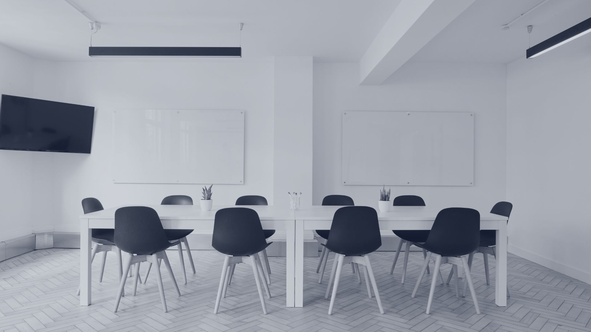 Open office with tables and chairs for a startup hiring legal guide