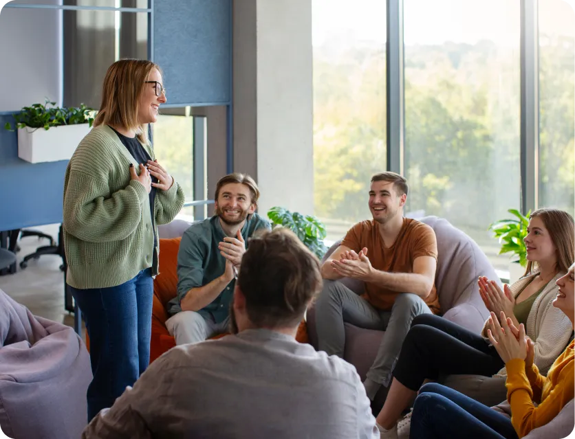 A group of people chatting and laughing