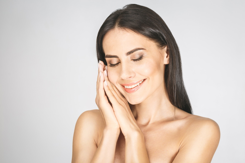 A woman with closed eyes.