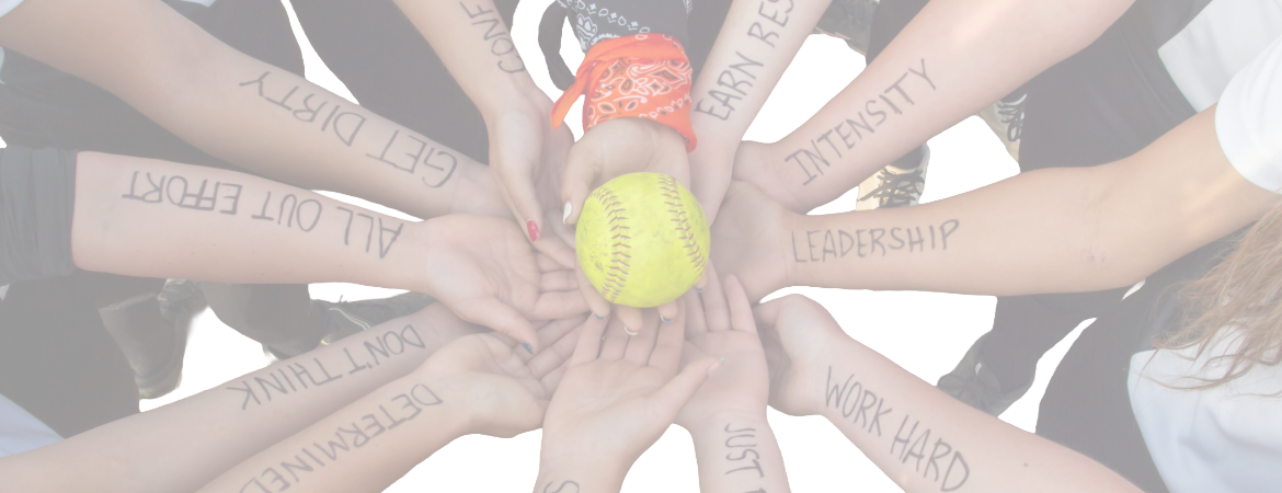 Girls putting hands together with letters on their arms