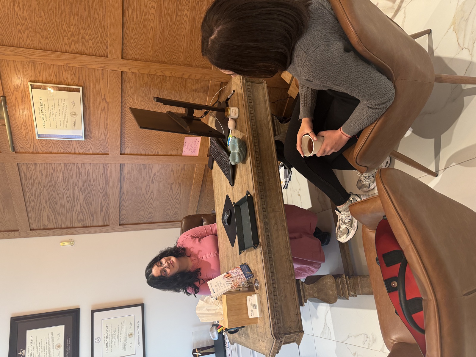 Materna provider talking with a patient during a consultation visit