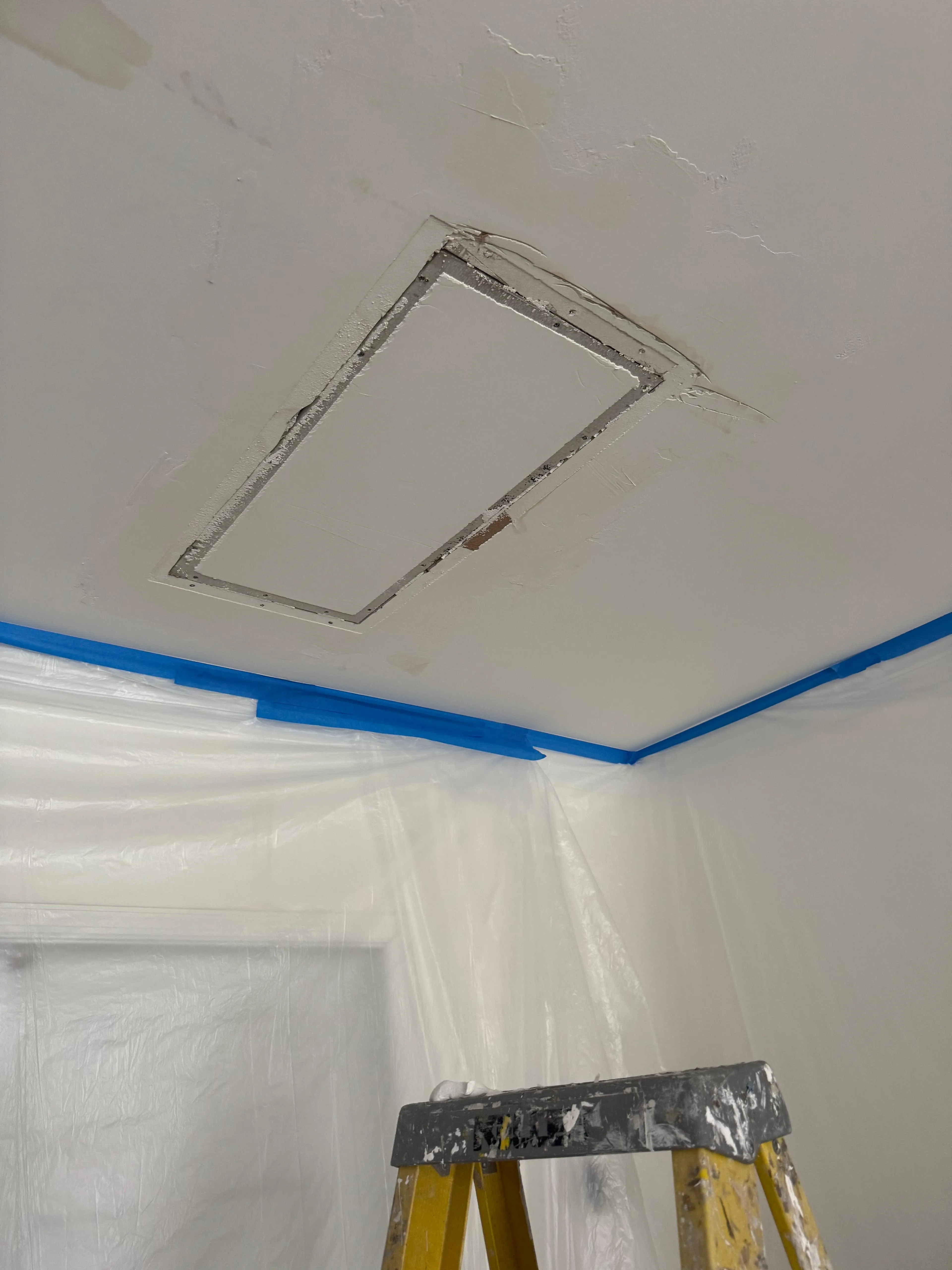 Repaired hole in ceiling