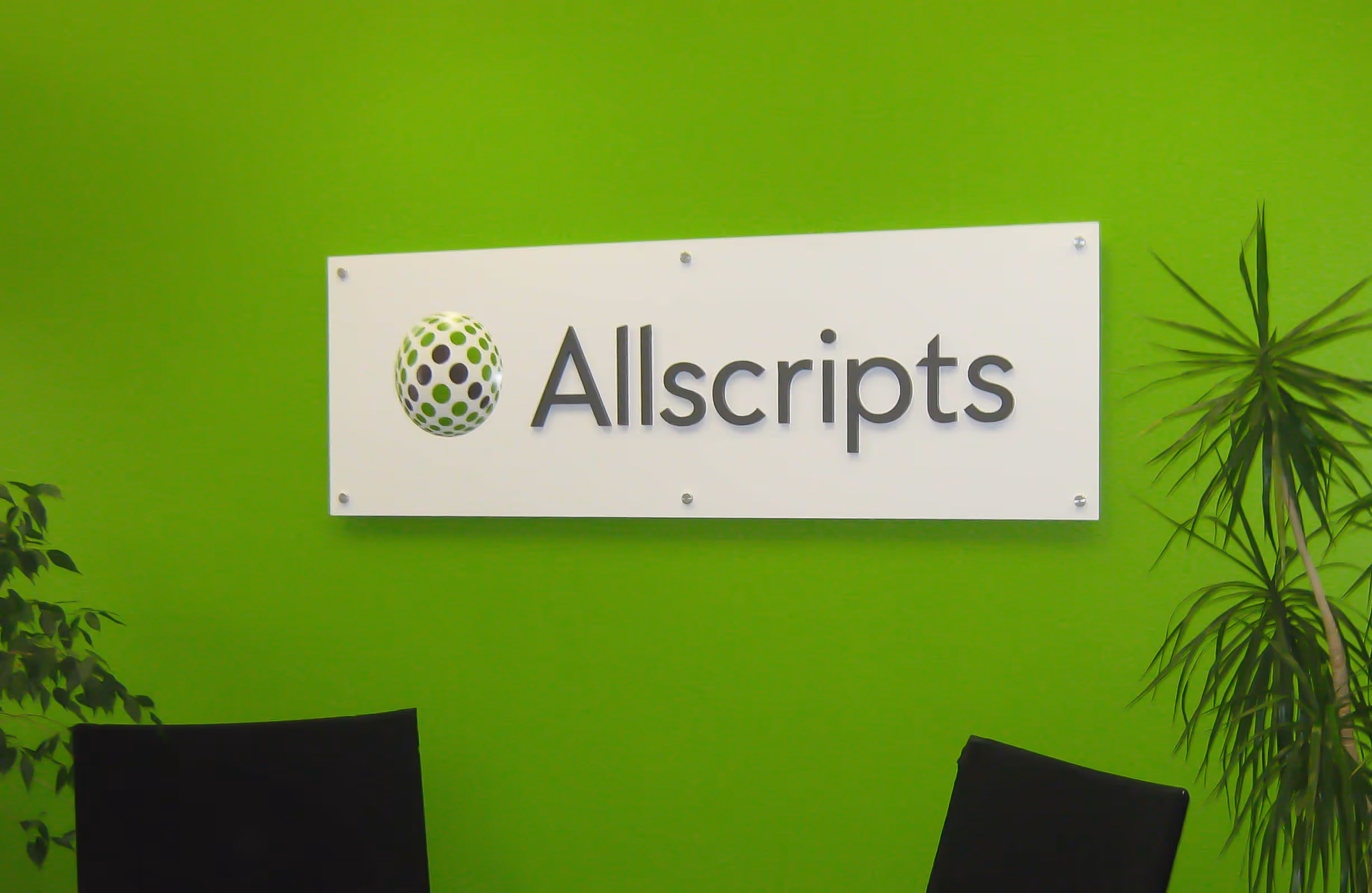 Large indoor sign for reception area mounted on wall