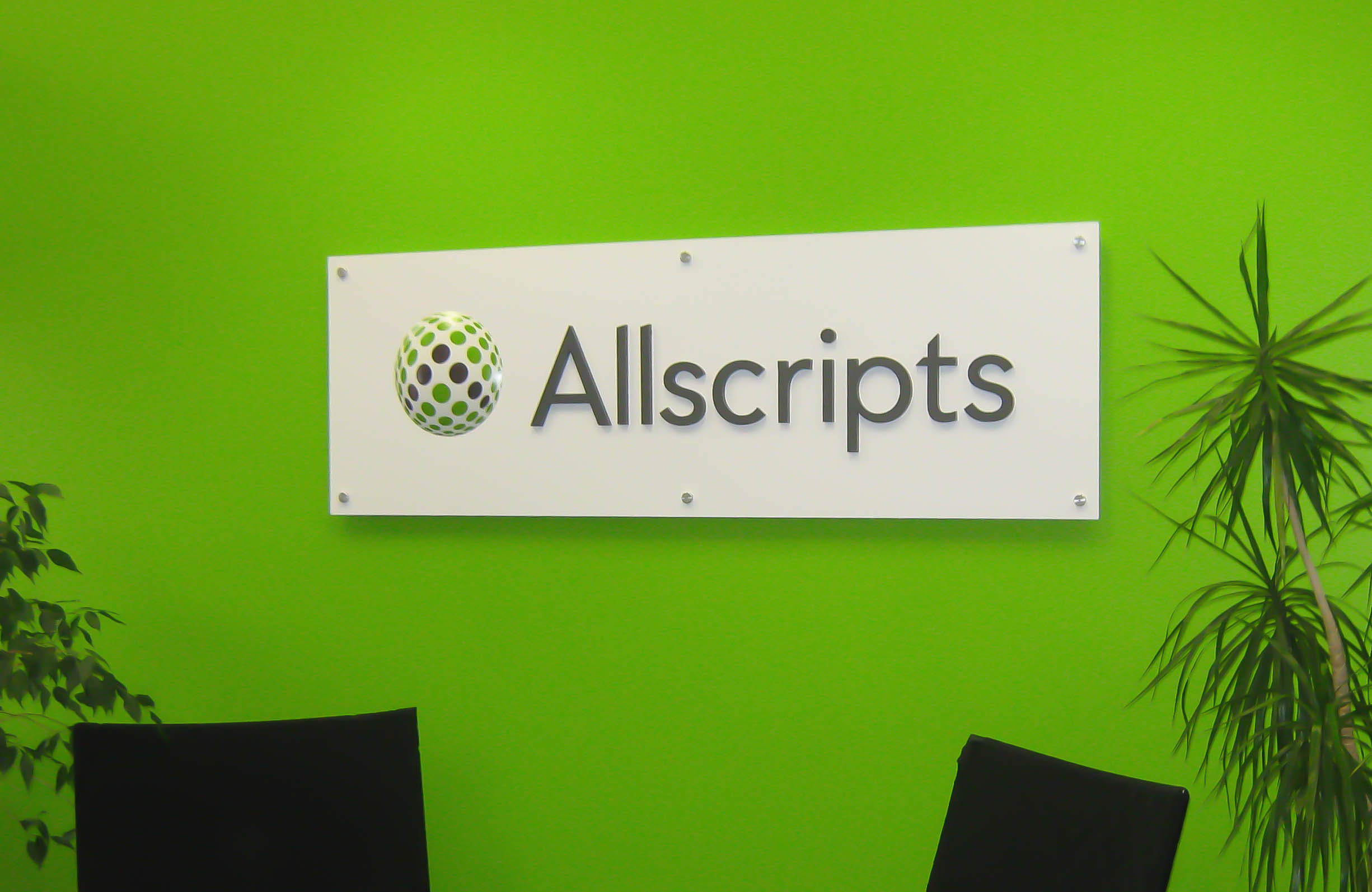 Large indoor sign for reception area mounted on wall