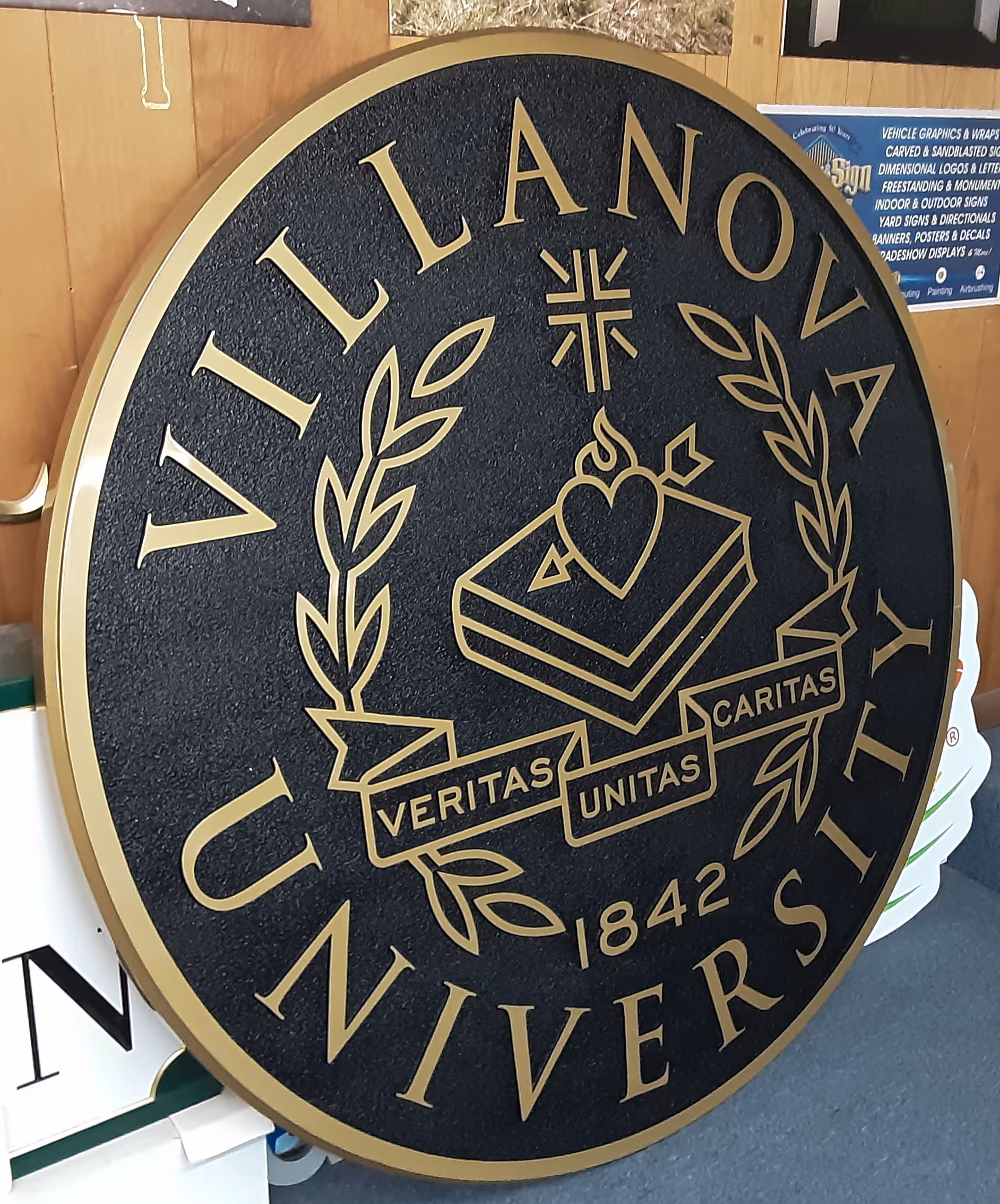 Circle-shaped precision-tooled bronze plaque