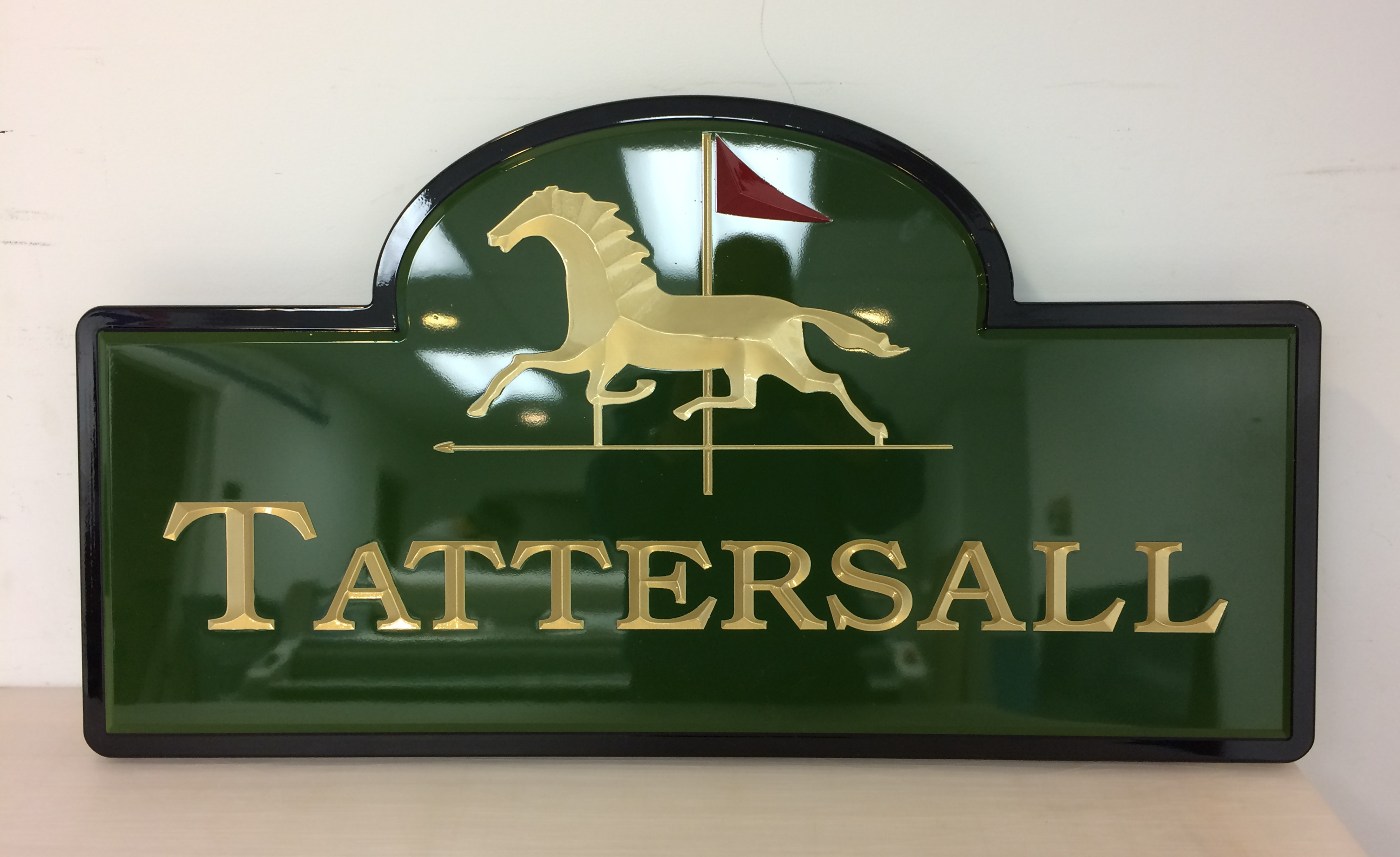 Carved HDU sign with raised letters and logo