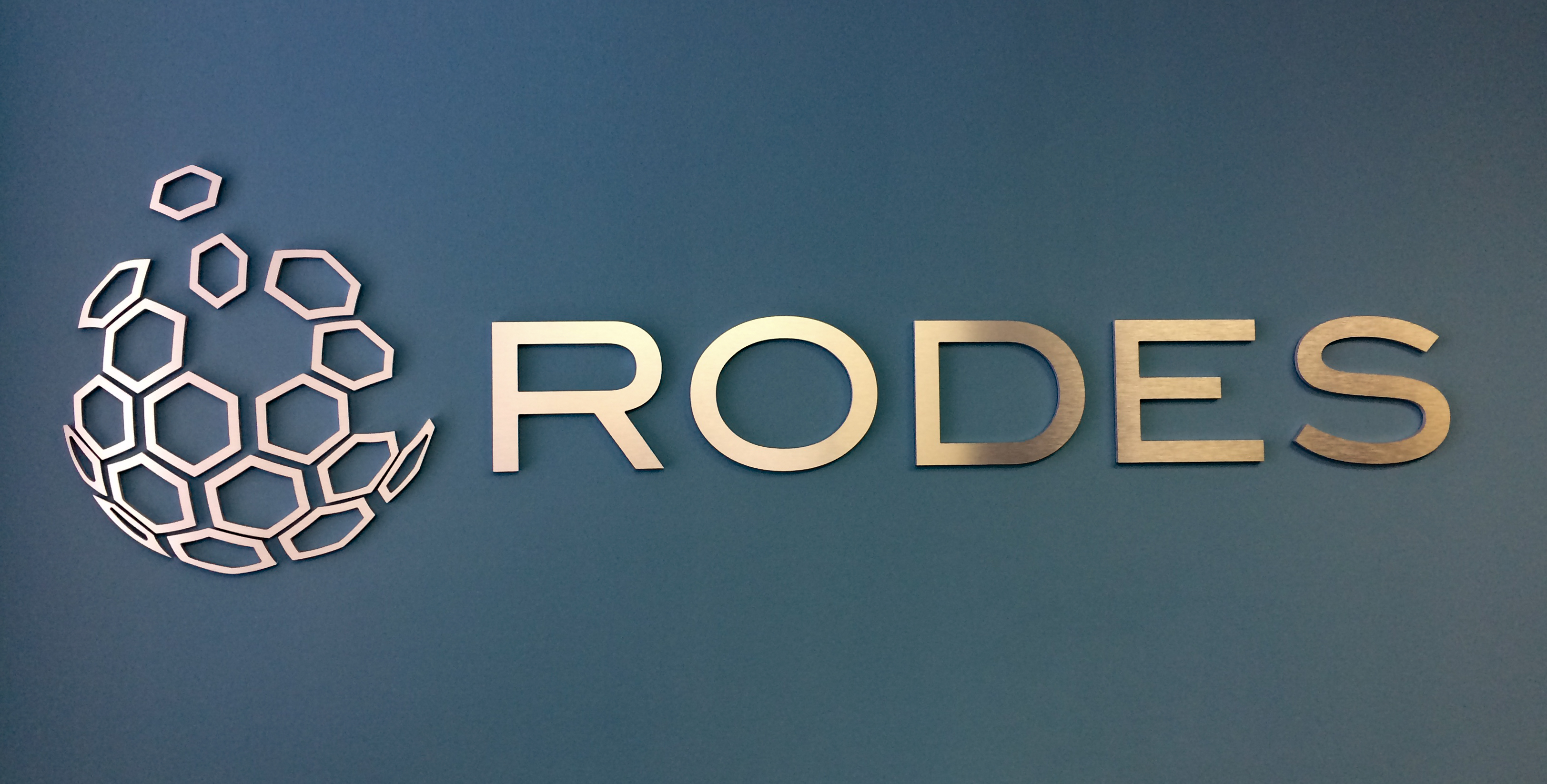 Brushed metal dimensional letters and logo