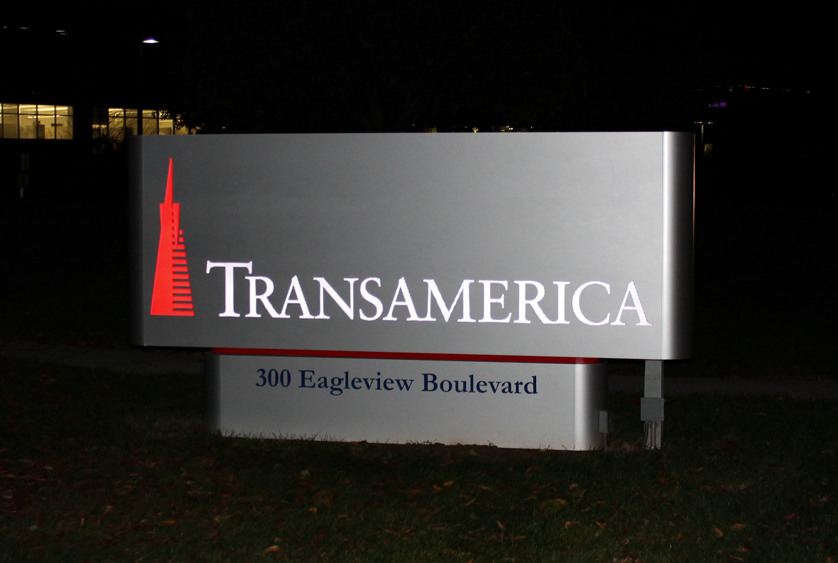 Gray aluminum monument sign with internal illumination of face letters