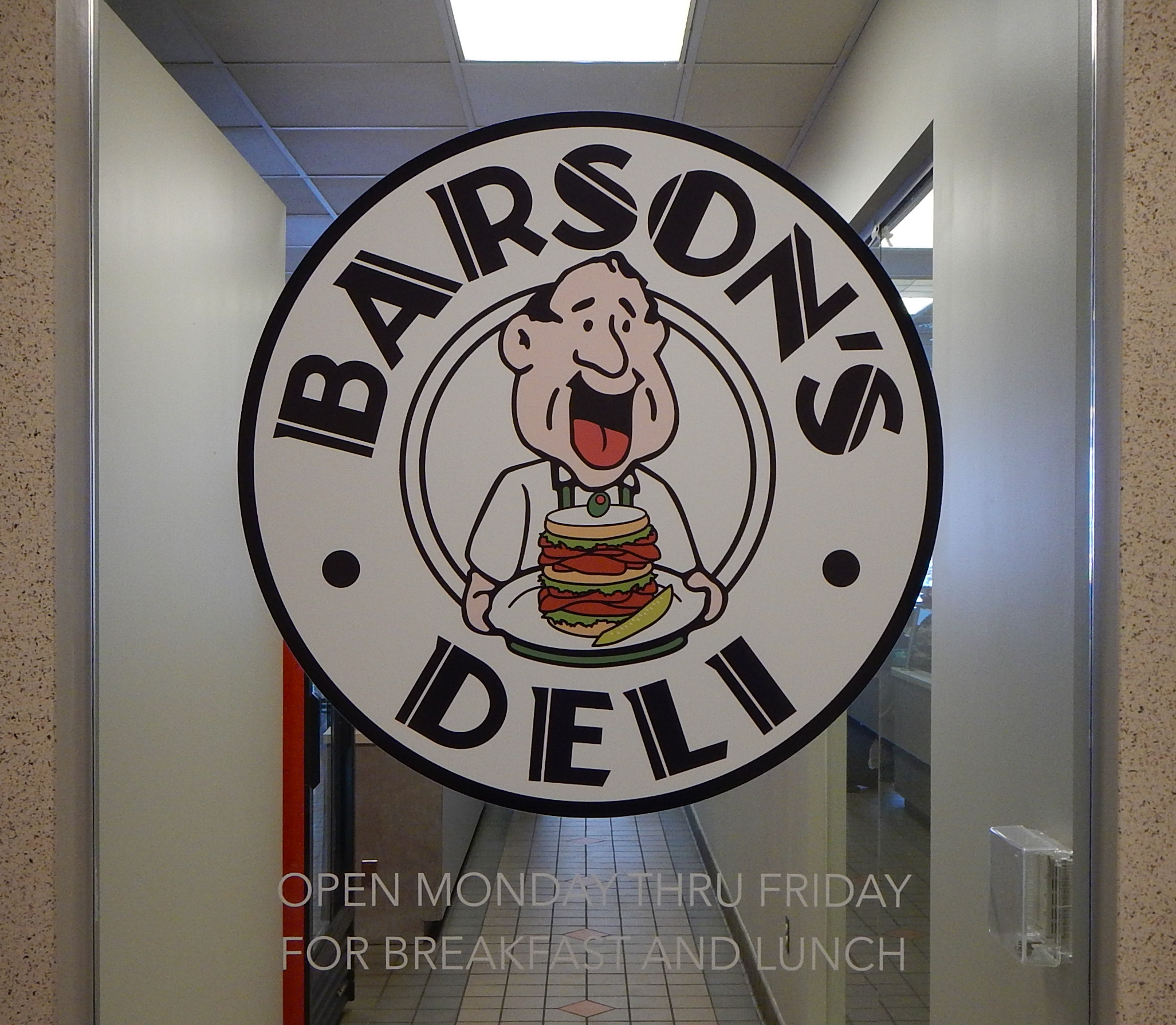 Deli logo vinyled on their front door glass