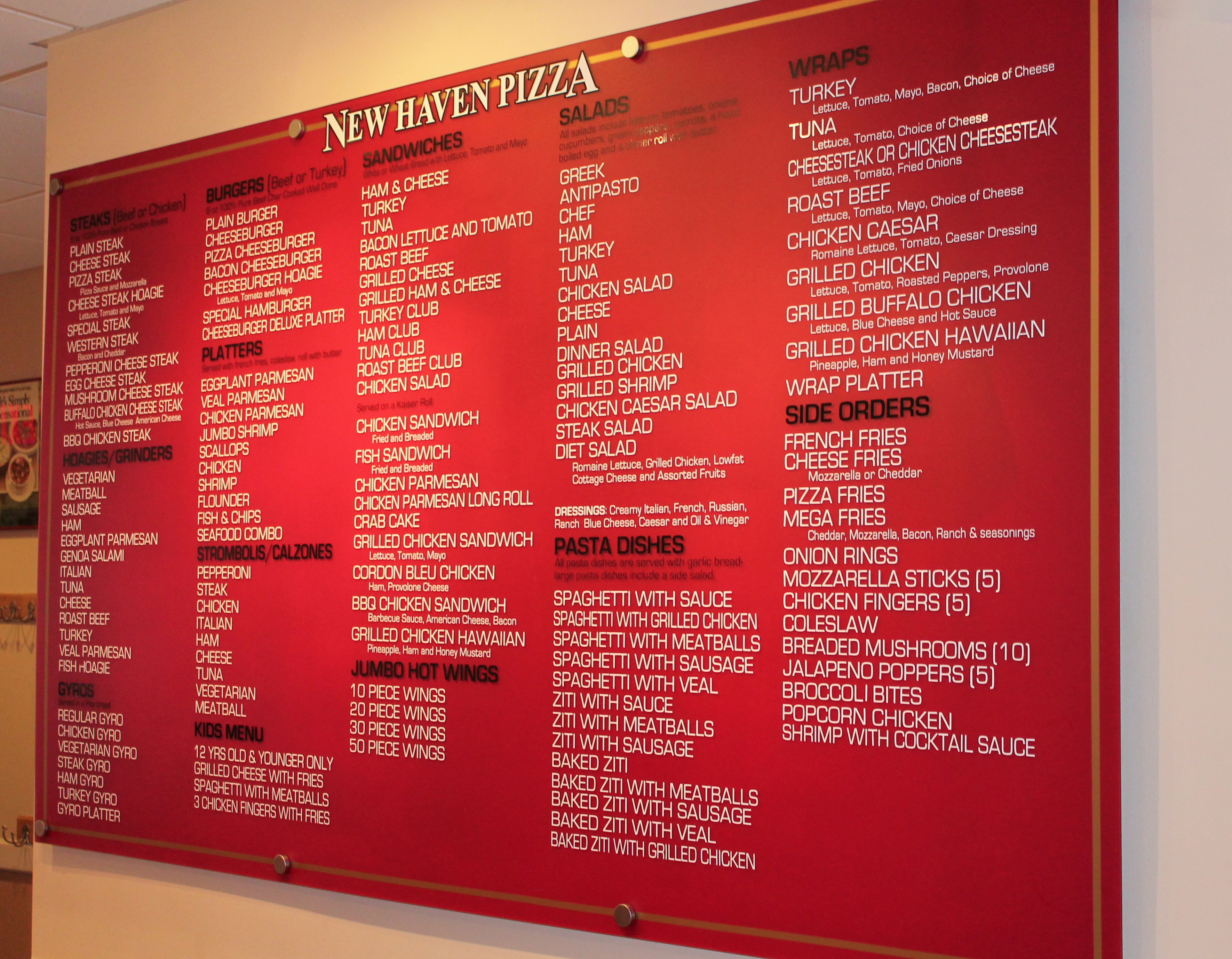 Red acrylic wall panel with restaurant menu