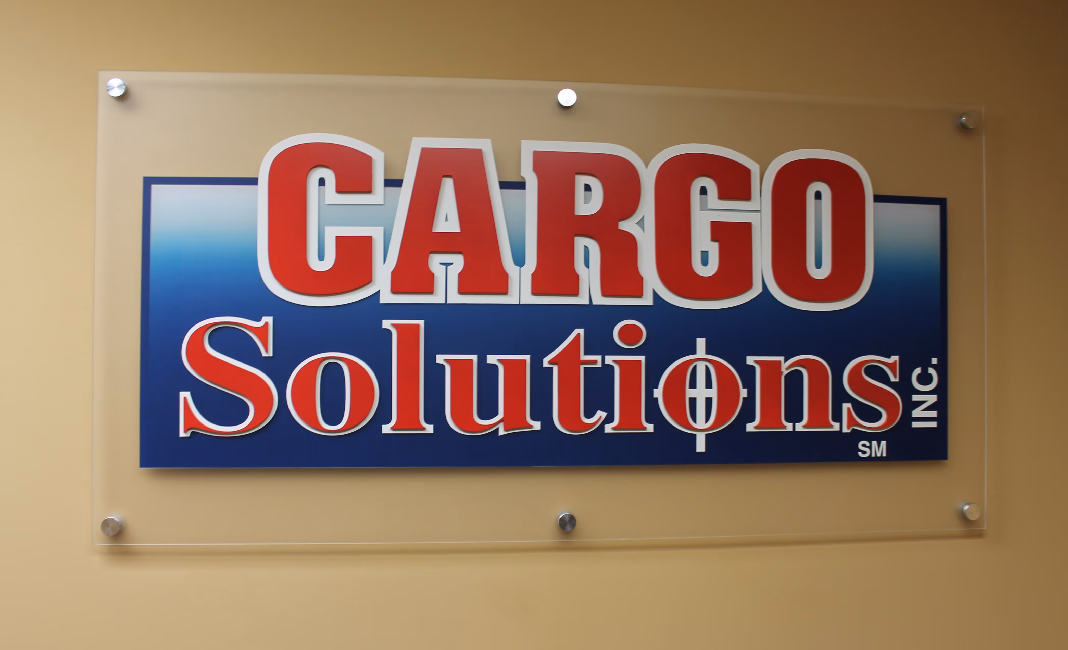 Vinyled company logo on an acrylic wall panel