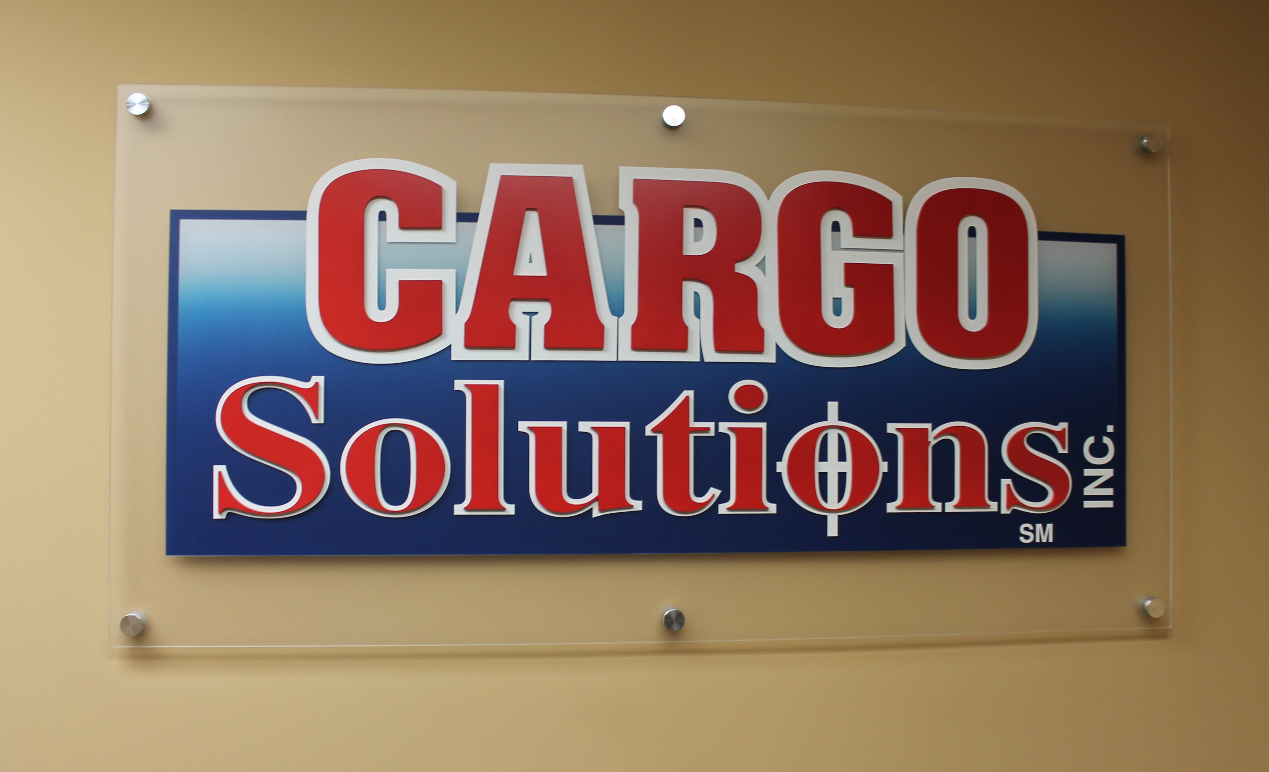 Large acrylic wall sign with plotted vinyl mounted on standoffs