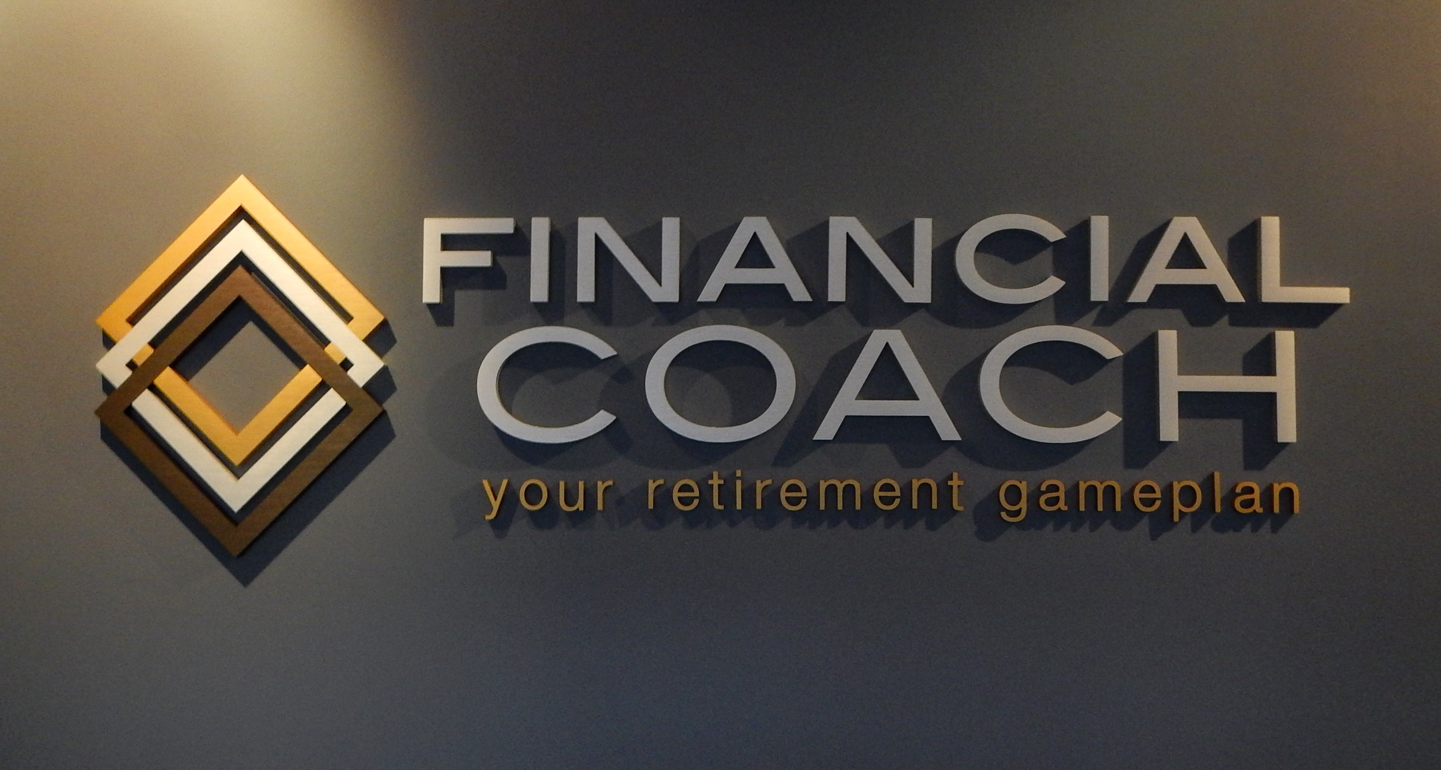 Brushed aluminum dimensional letters and logo