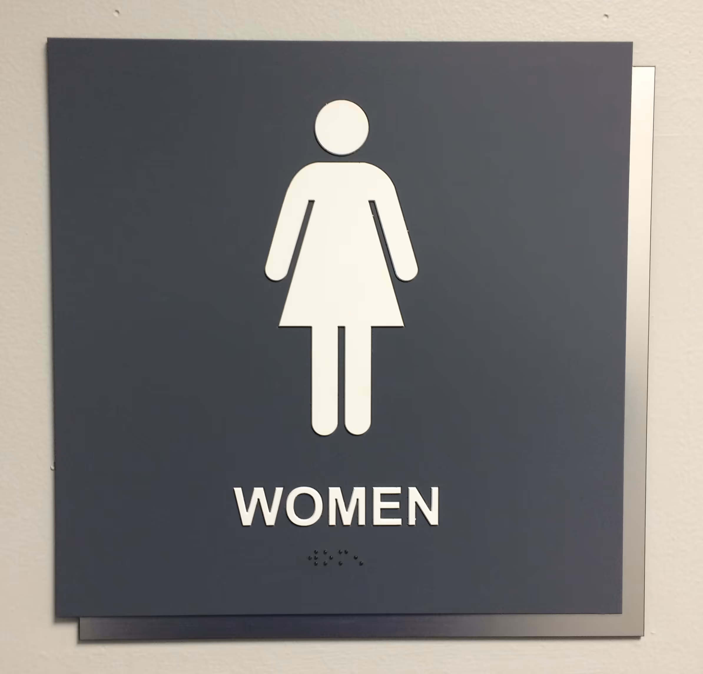 Custom ADA restroom sign with brand colors