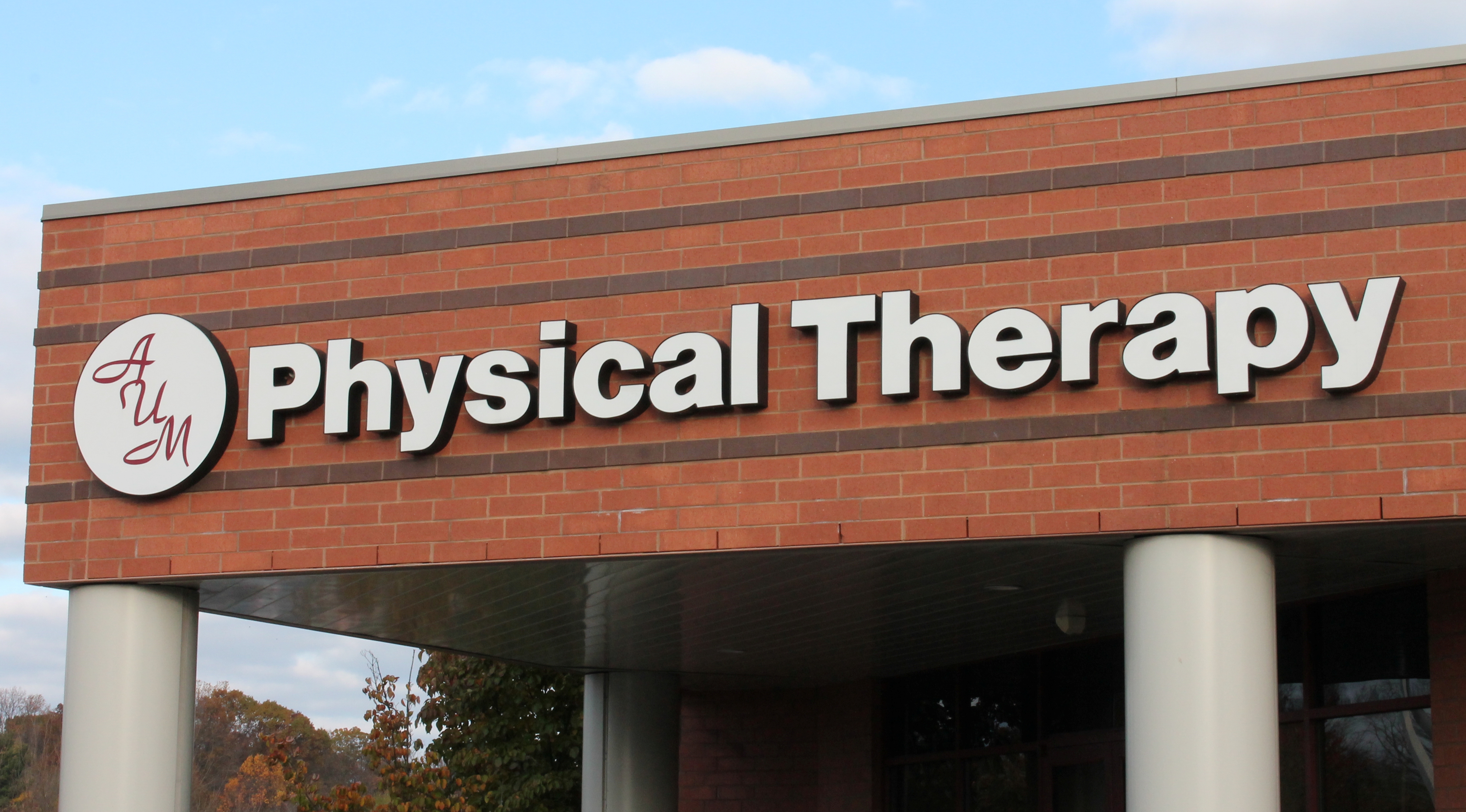 Large white channel letters for a physical therapy office