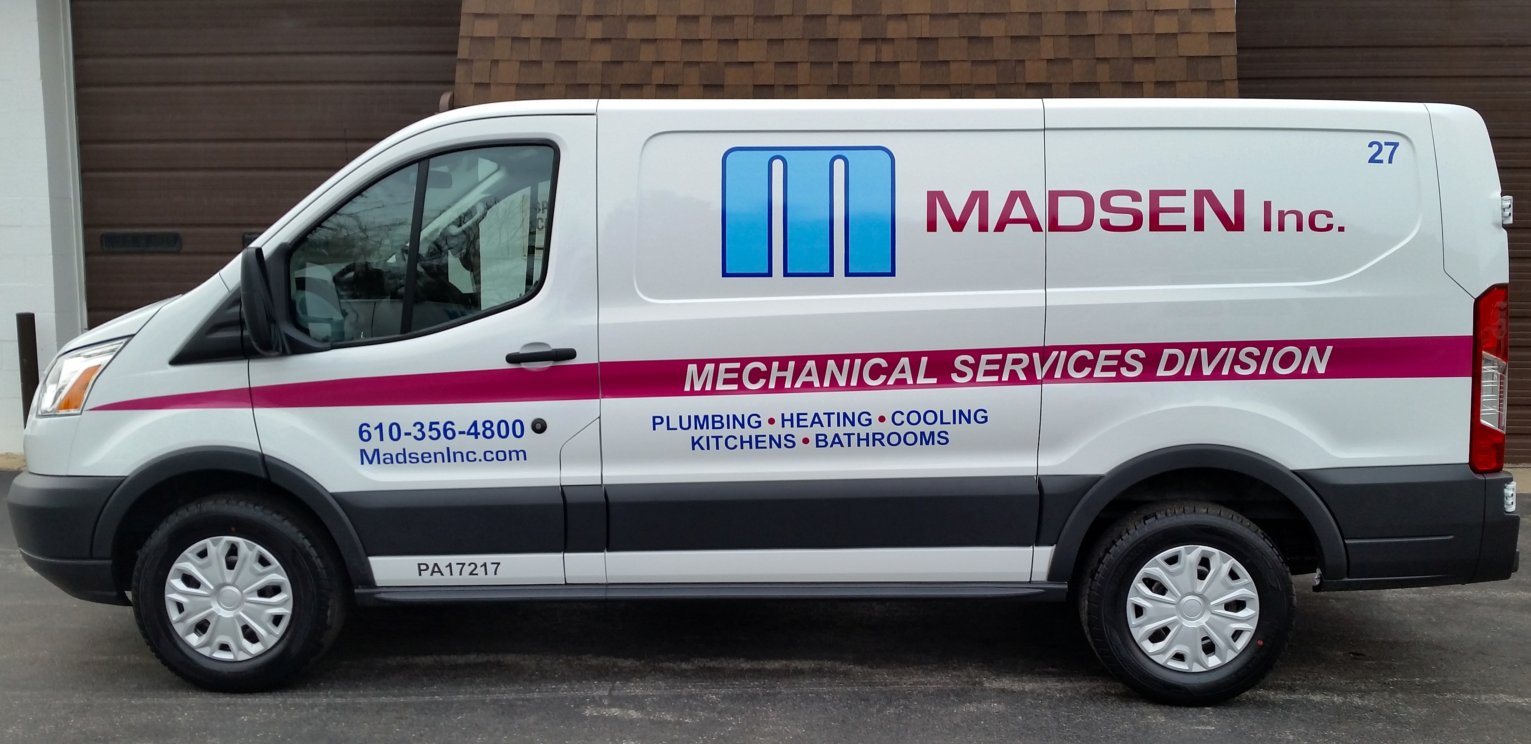 Custom vehicle wrap for a plumbing services van