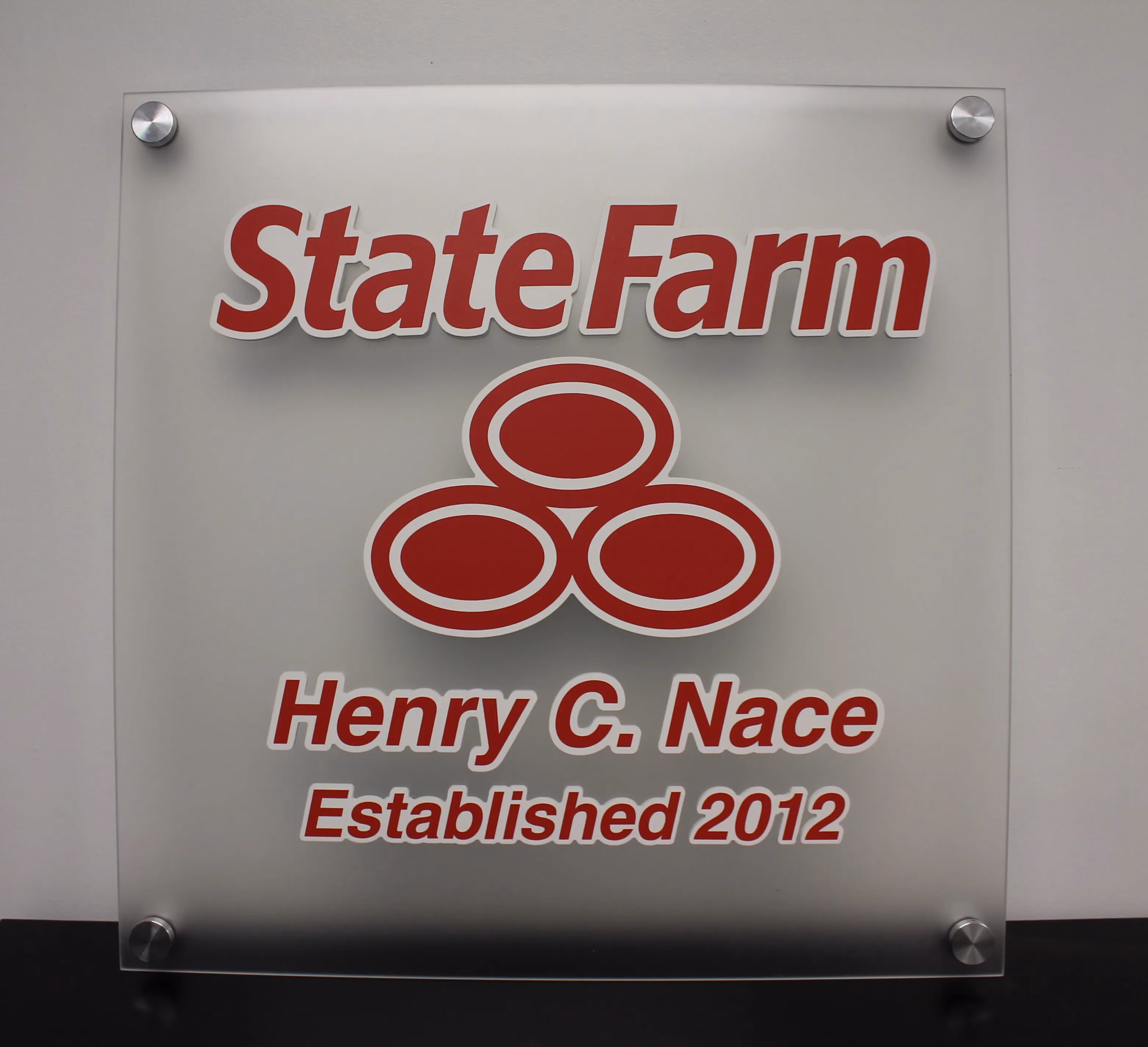 Plotted and weeded vinyl on frost acrylic mounted with standoffs
