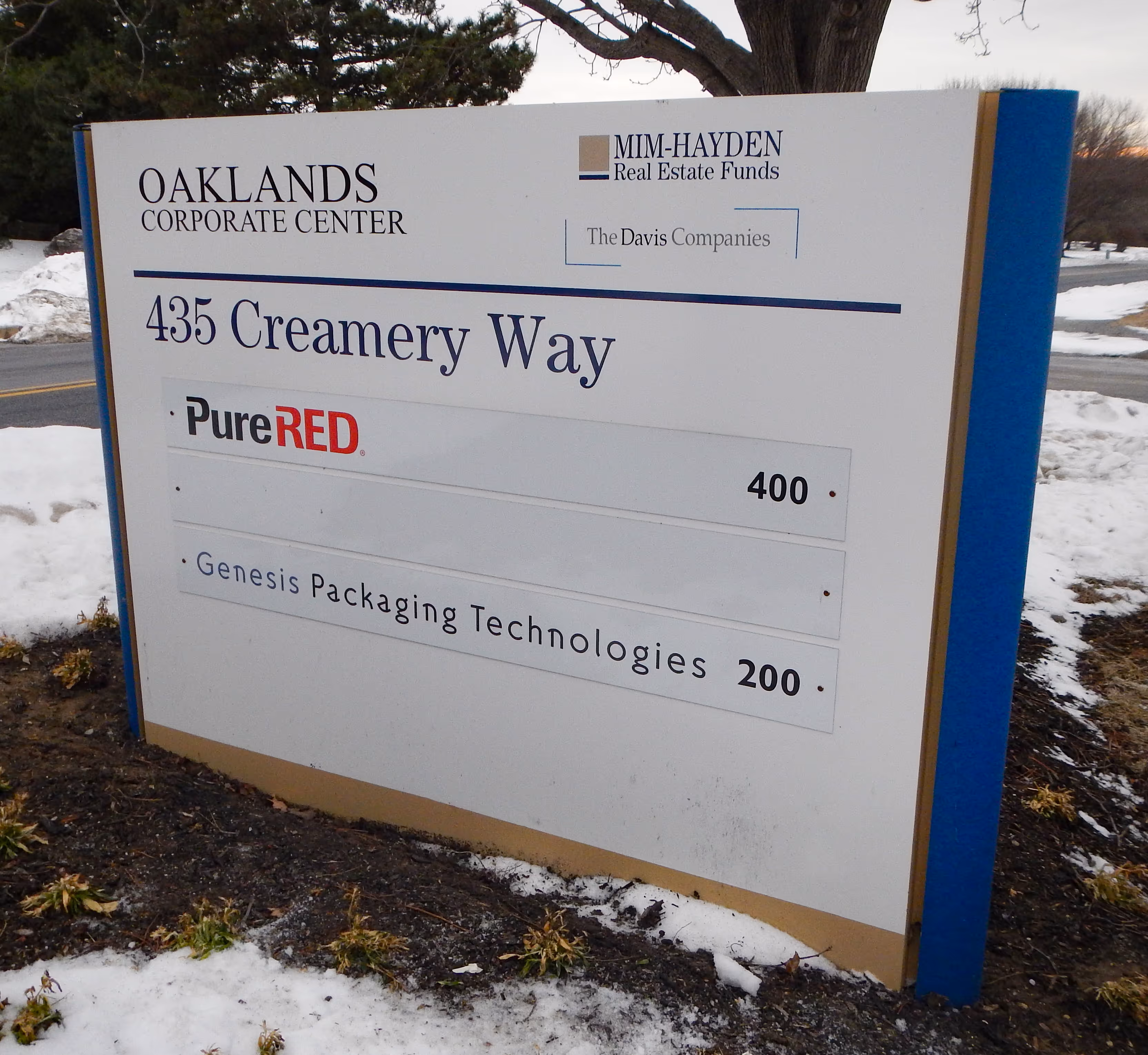 Building directory on a parking lot monument sign