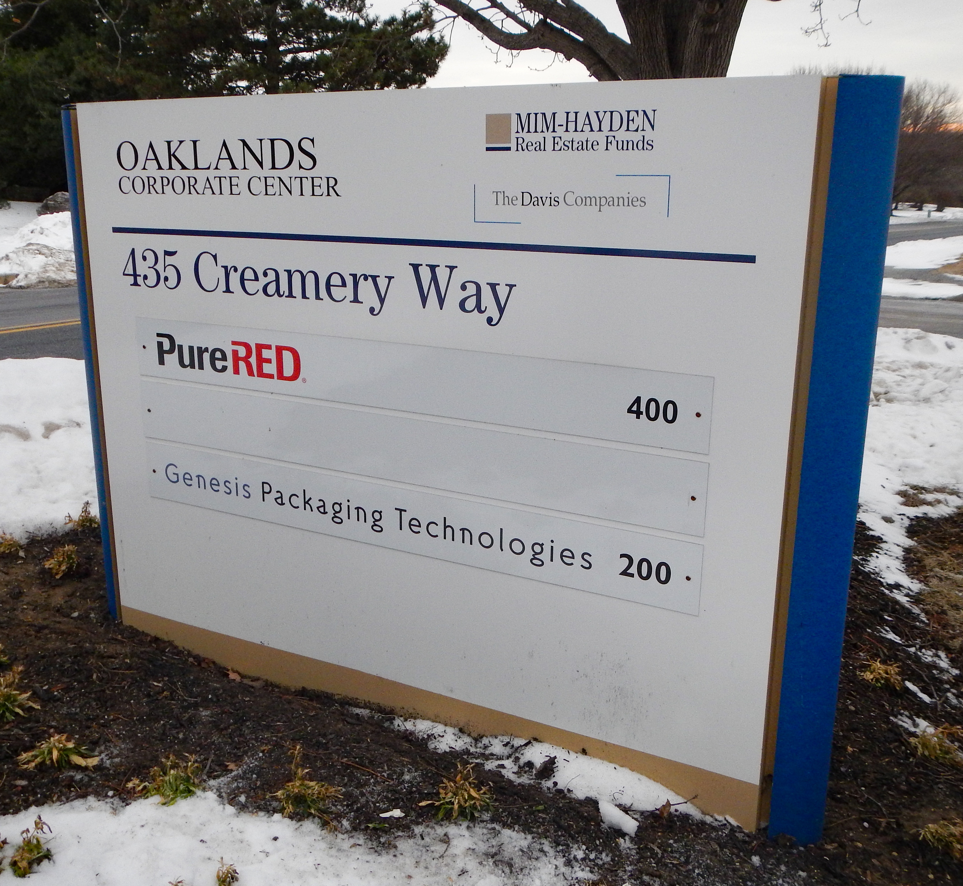 Building directory on a parking lot monument sign