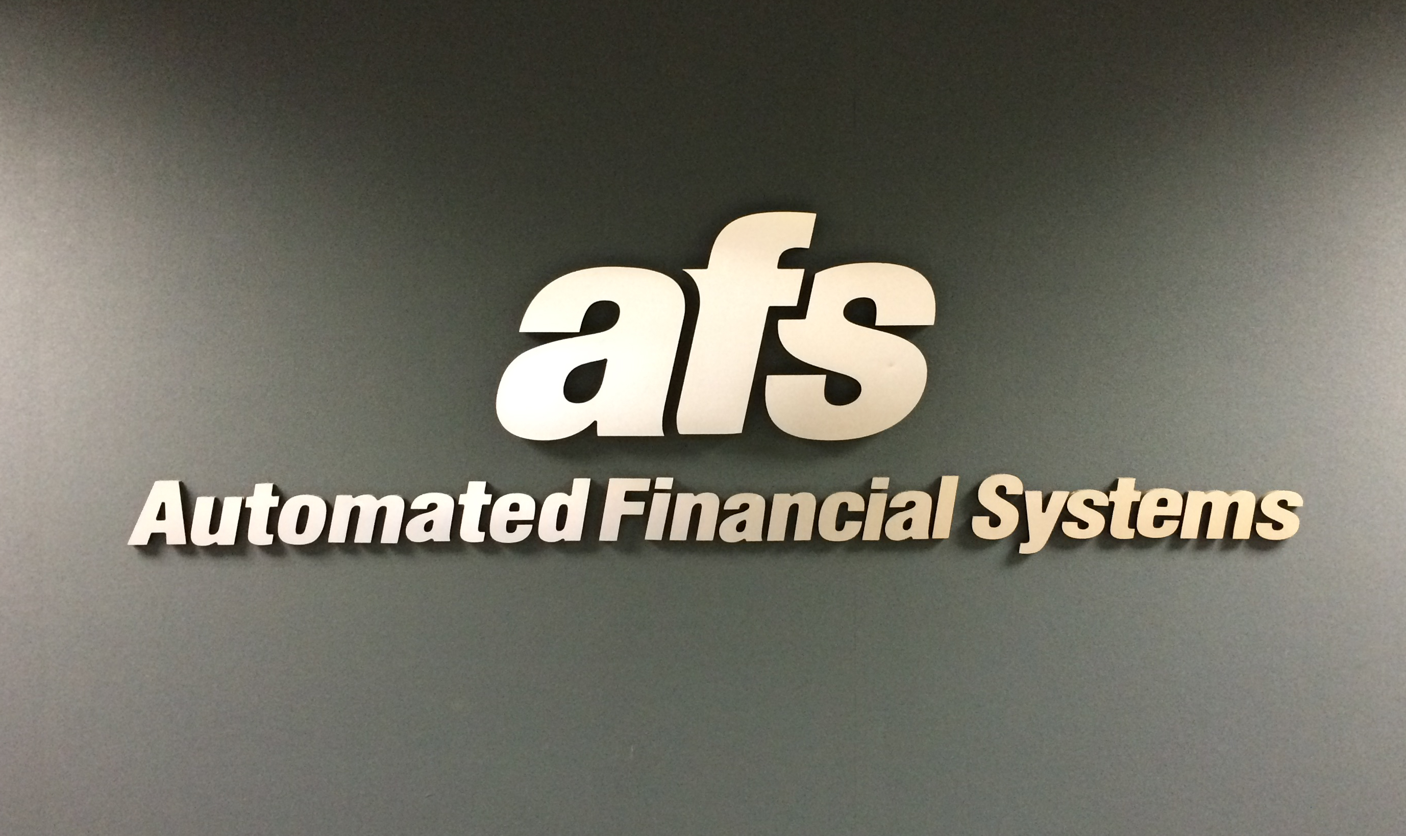 Bright silver dimensional letters and logo