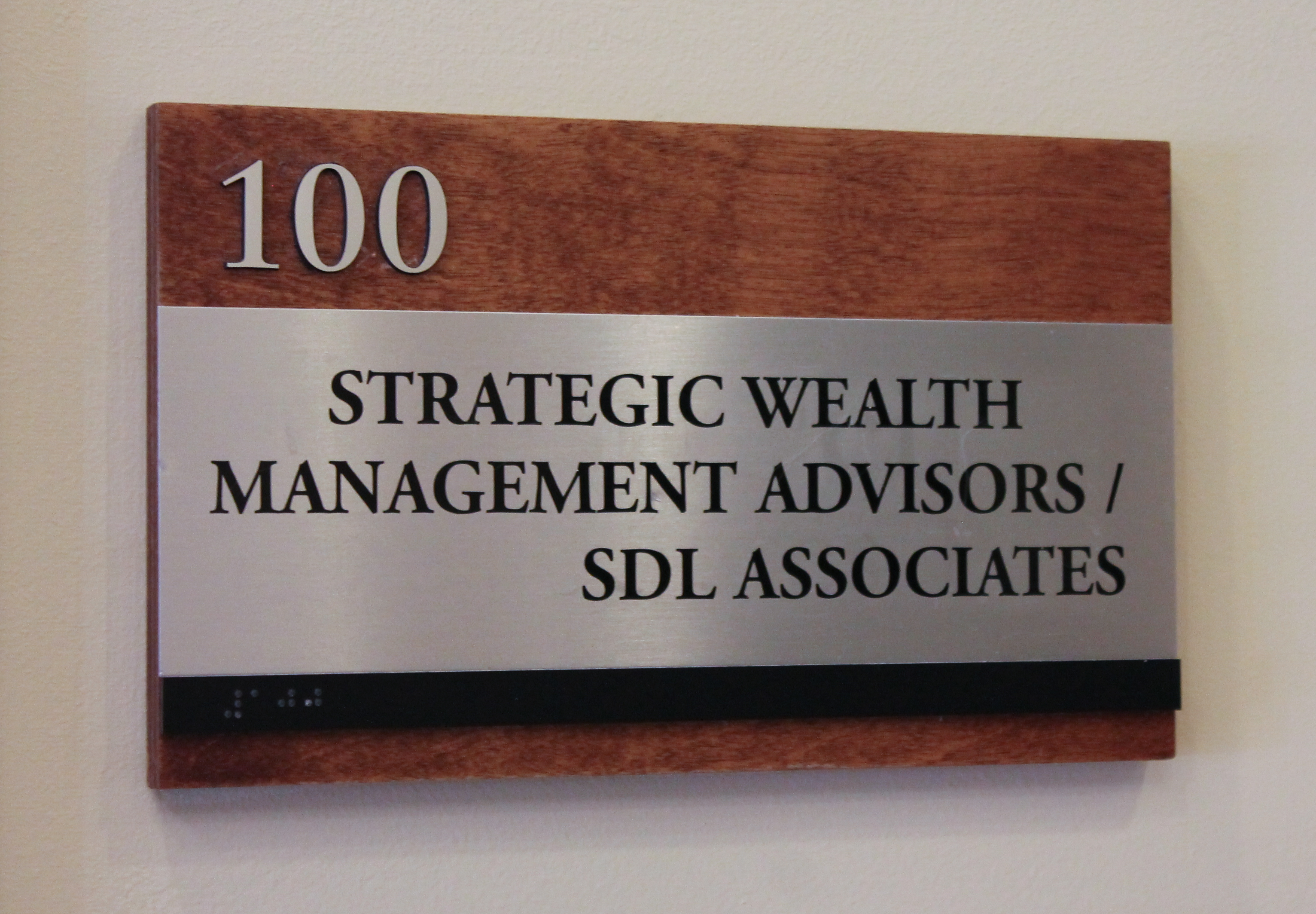Custom ADA room sign with brushed aluminum component