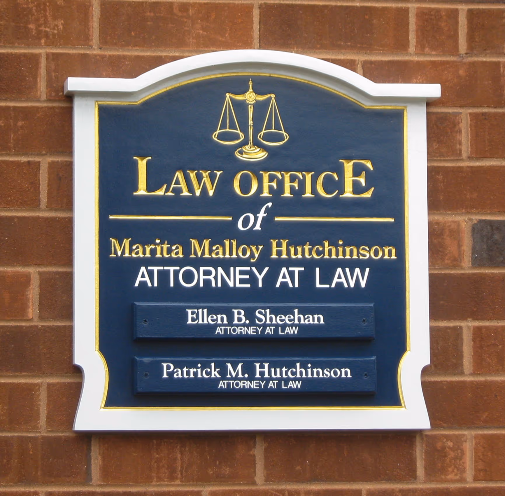Carved HDU wall sign outside a law firm