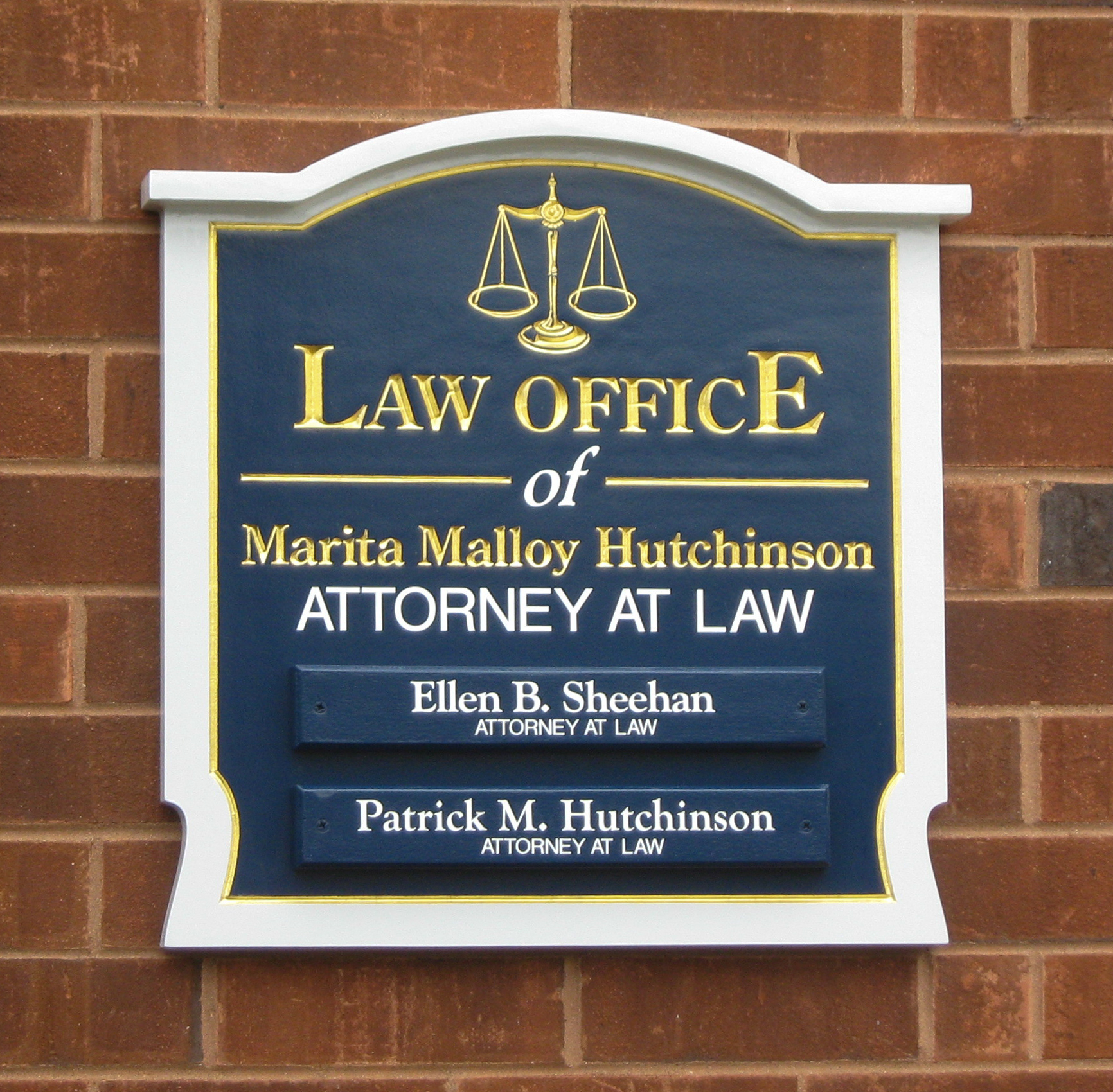 Carved HDU wall sign outside a law firm