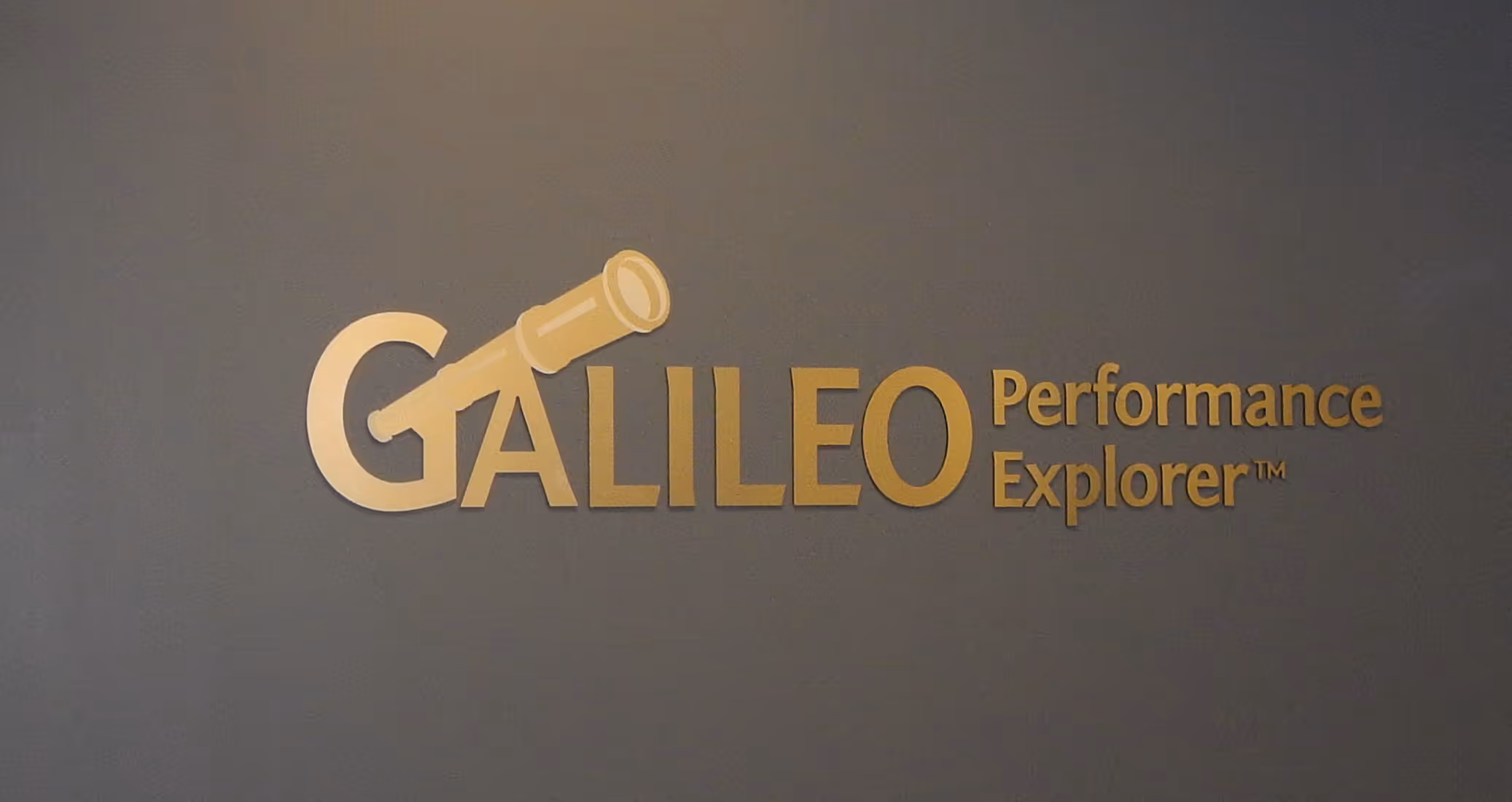 Gold, custom-font dimensional letters with company logo
