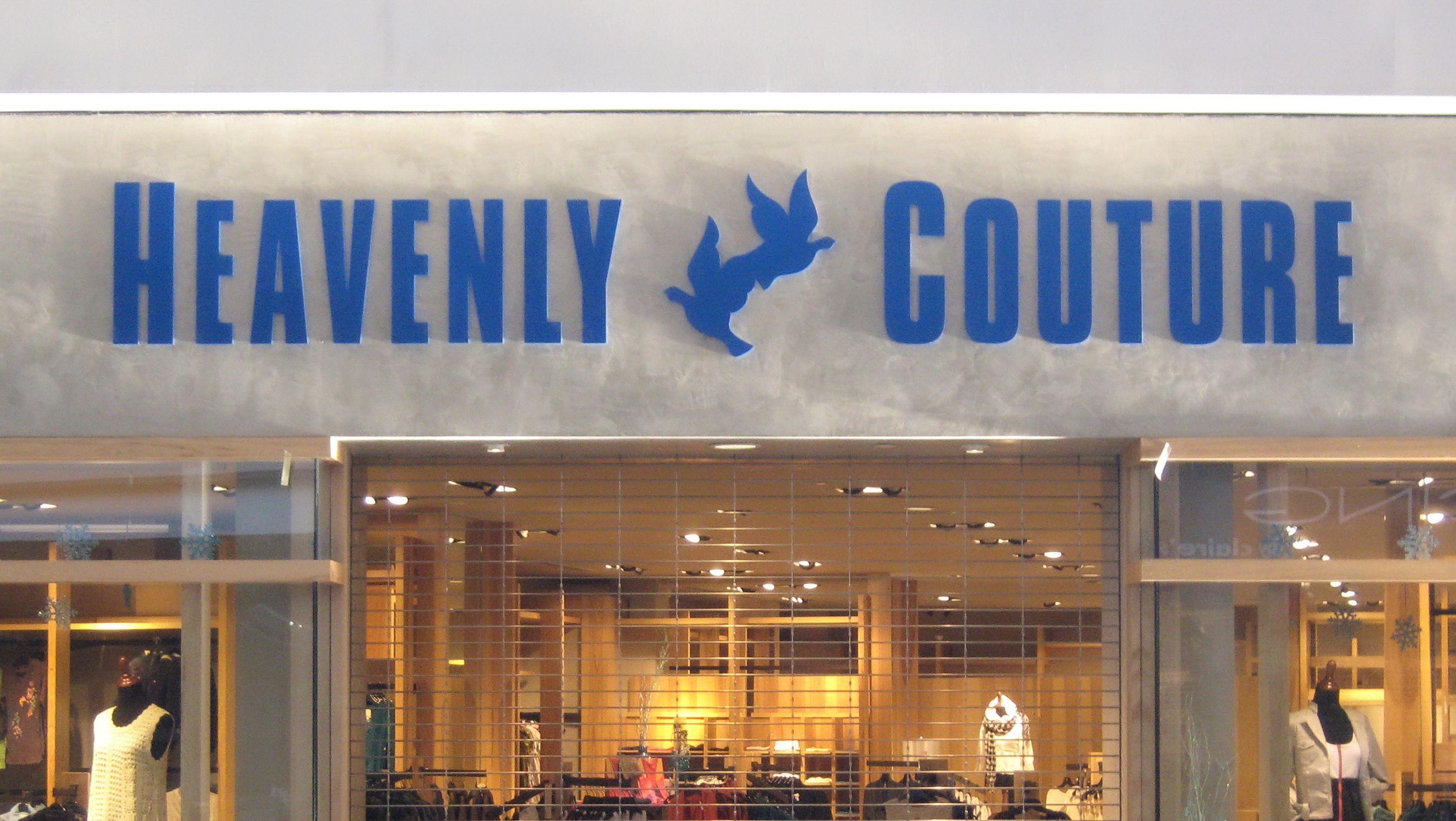 Blue channel letters on a mall corridor