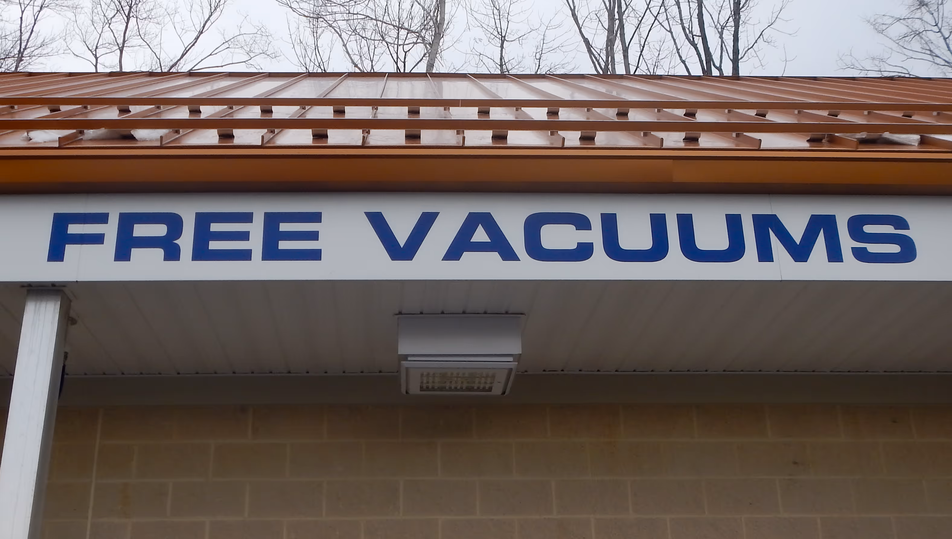 Exterior vinyl advertising for a car wash