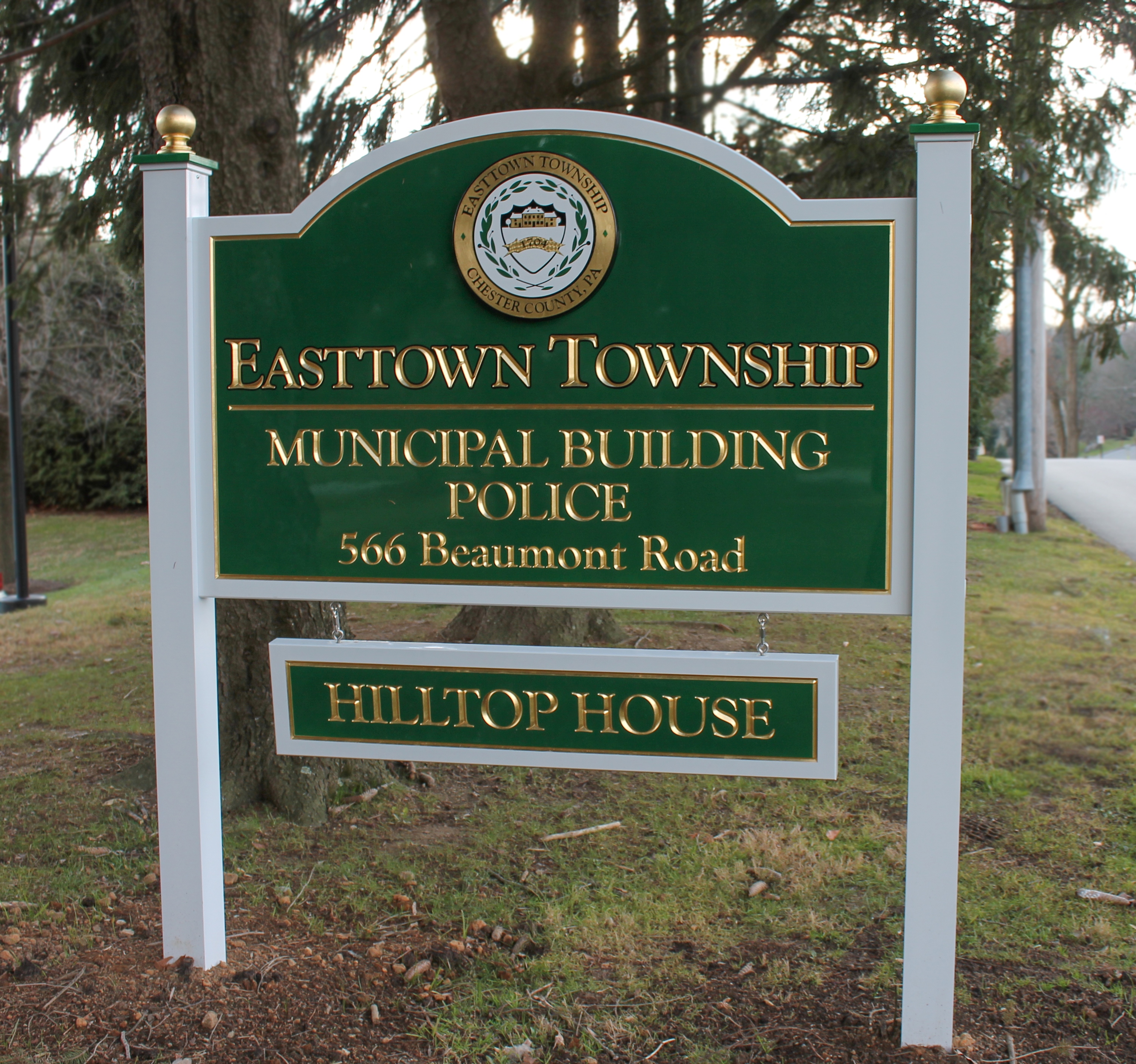 Green, carved HDU sign with gold leaf lettering