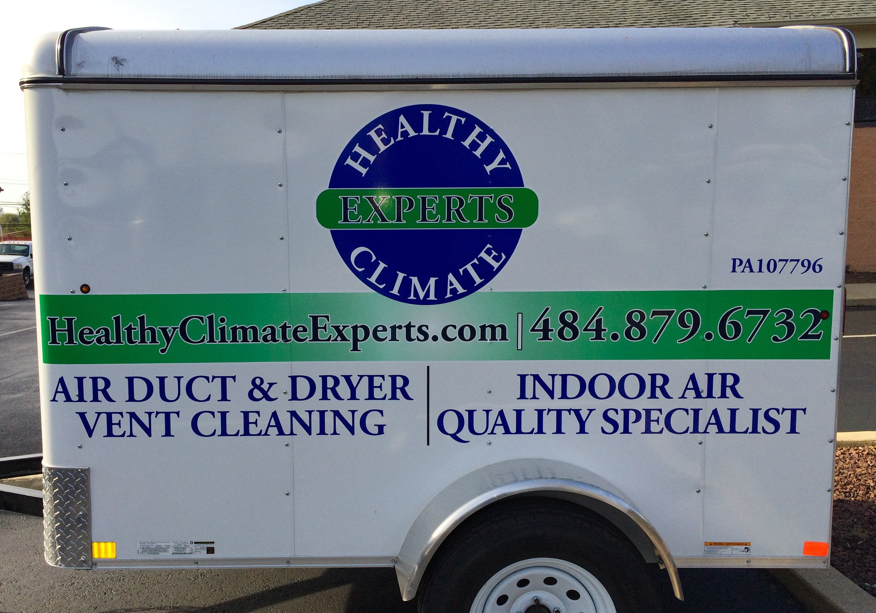 Green and purple vinyl graphics on a pull-trailer