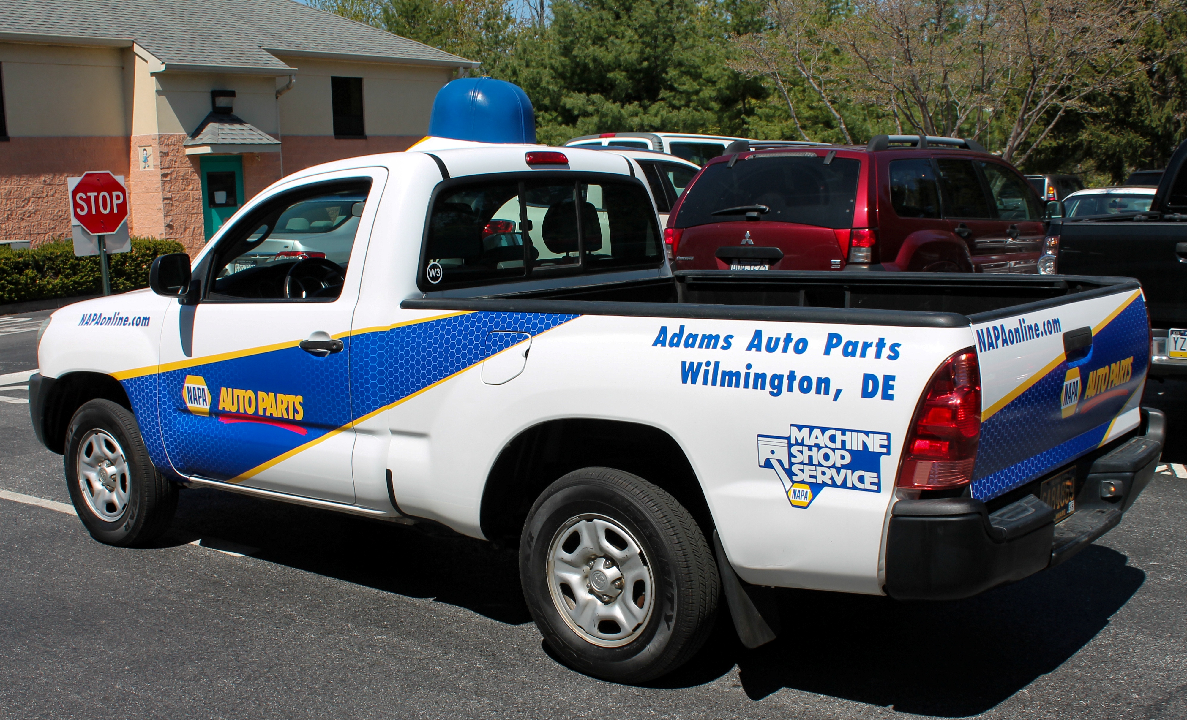Custom vinyl wrap for an auto parts delivery truck