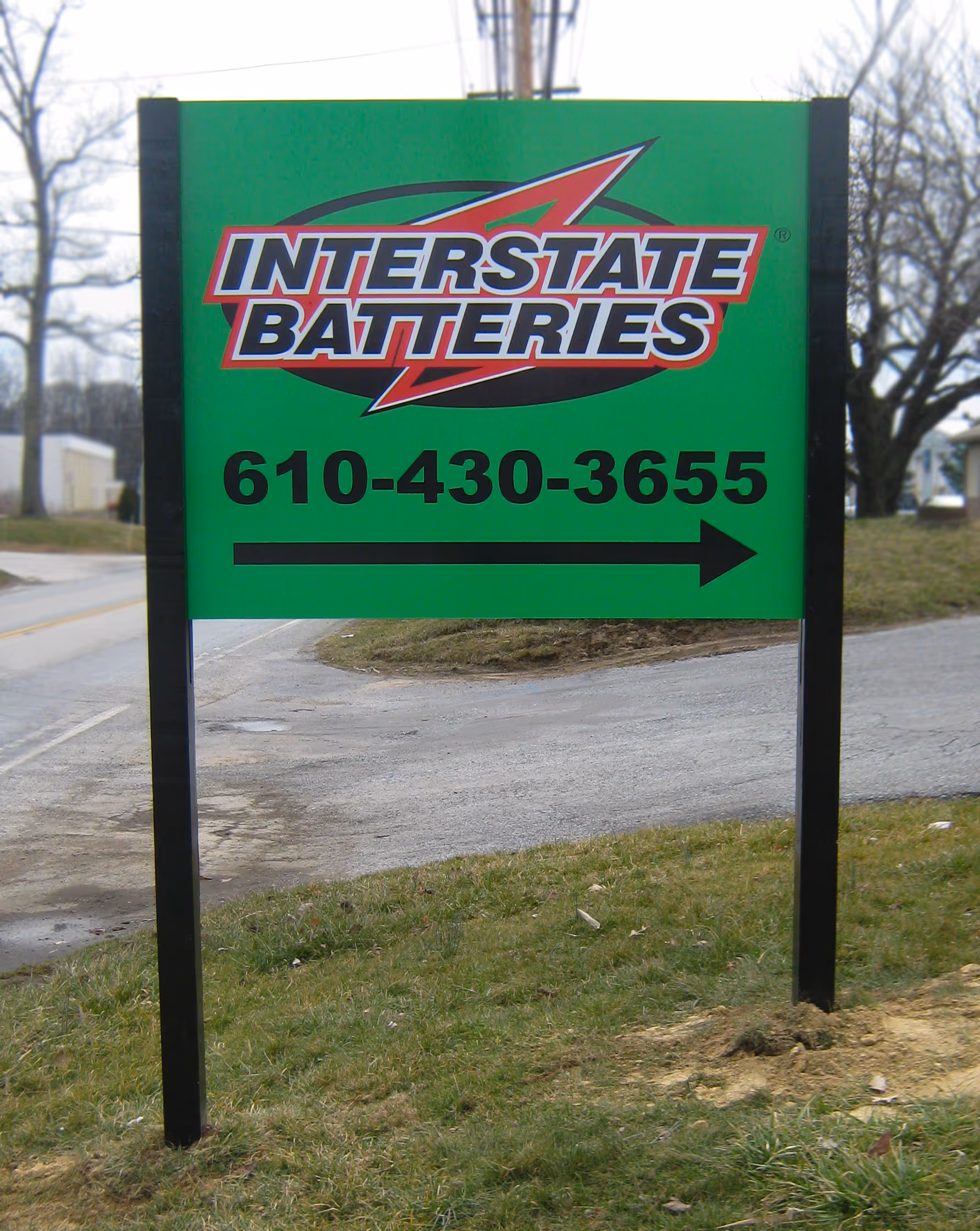 Green post and panel sign