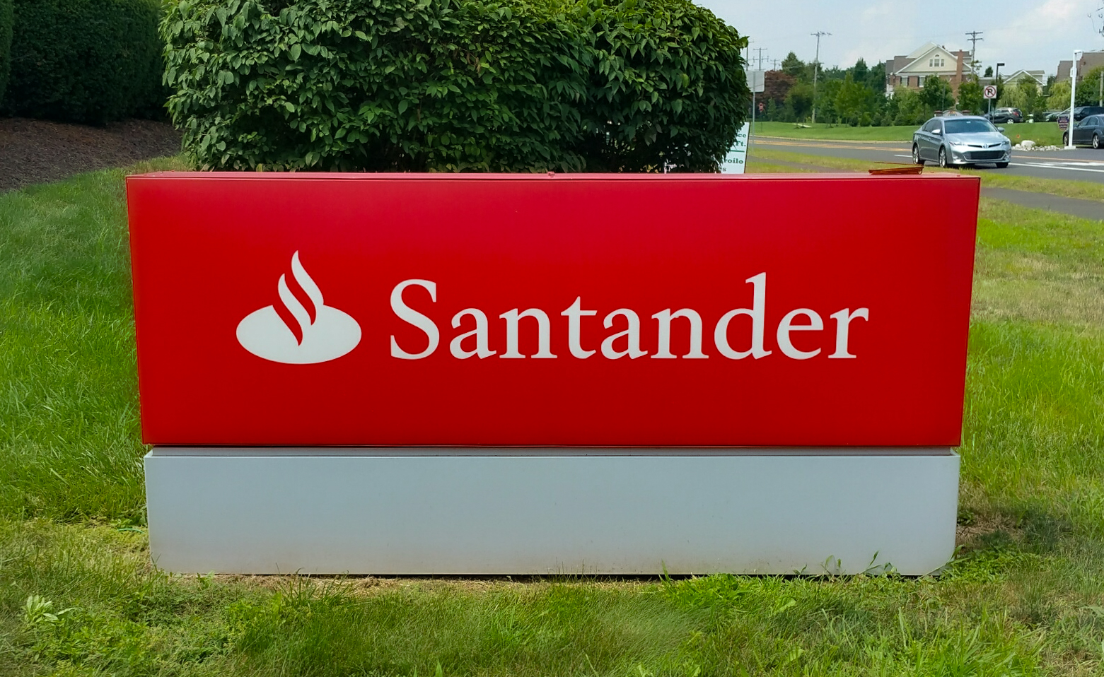 Red aluminum box monument sign on a two-tone base