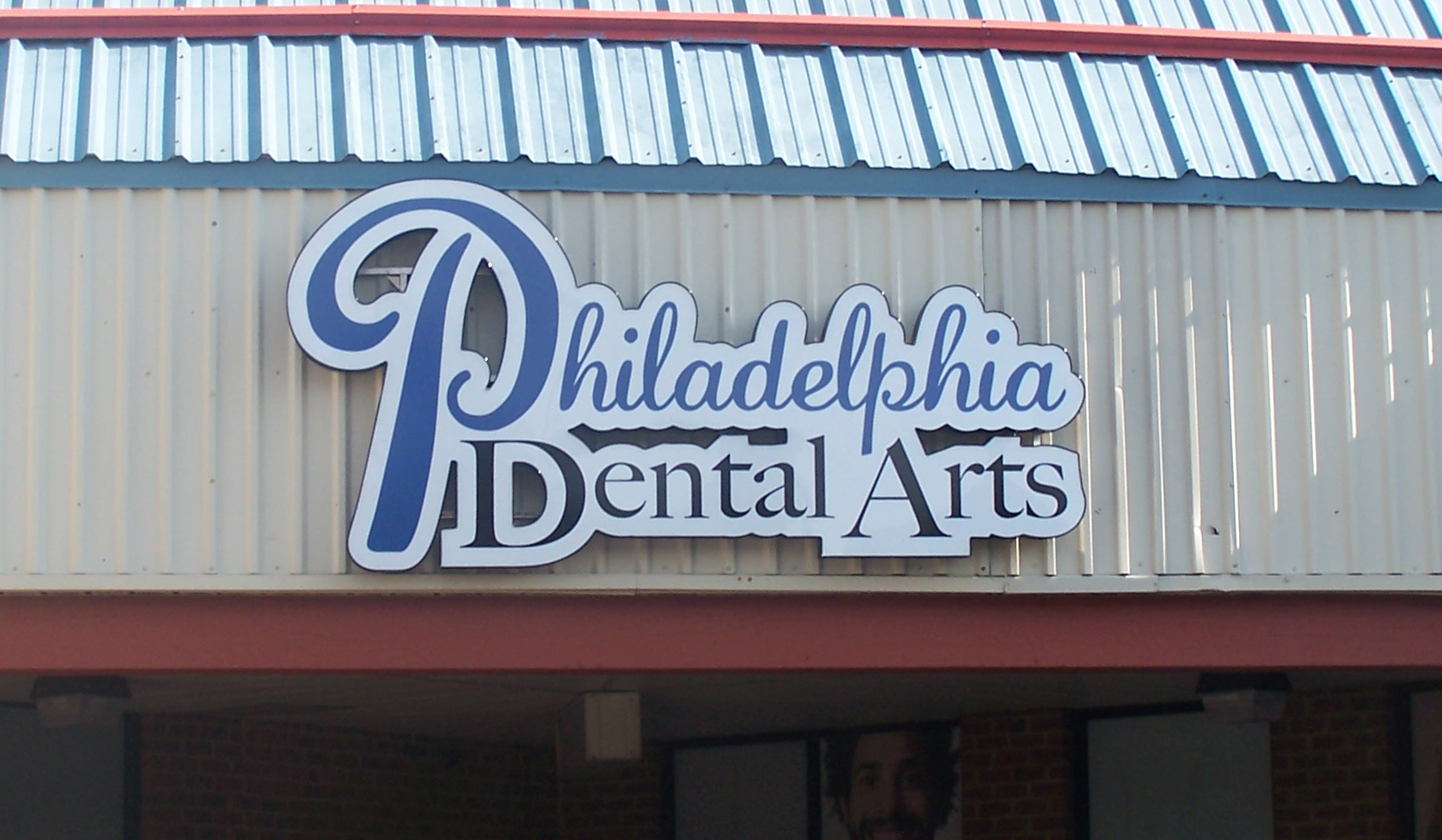 Exterior channel letters mounted outside a storefront