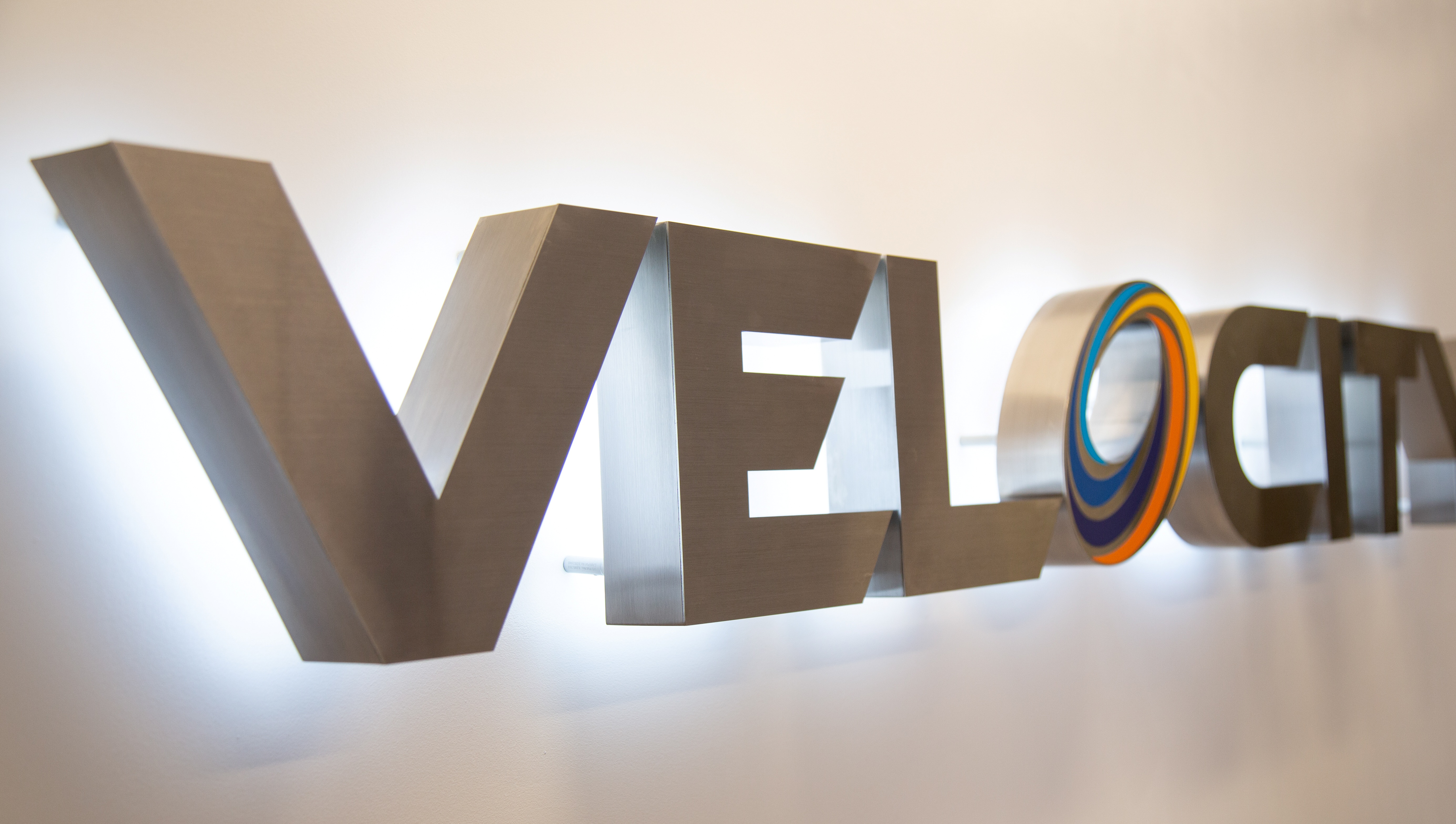 Halo-lit aluminum channel letters on an interior wall